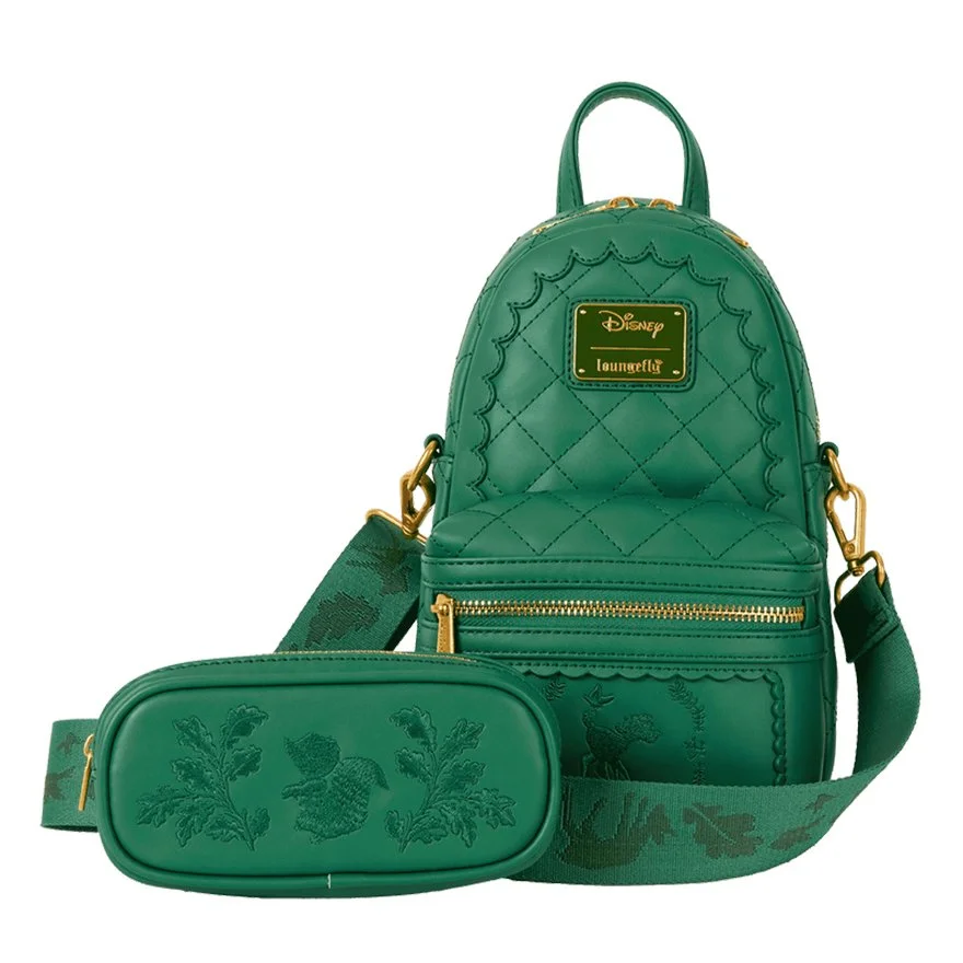 Deep green quilted faux leather mini-backpack  accessory from Loungefly. Details imprinted on the fabric are flowers and leaves and the Bambi logo on the front. The back includes a strap to wear as a crossbody bag and a mini-bag which can be used as 