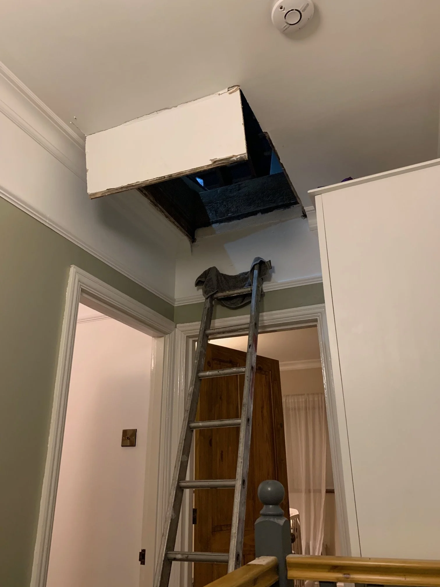 Landing Refurbishment. Painting, coving, skirting boards, sanding and painting the stairs. Ceiling rose. New doors sanded and varnished. New loft hatch.