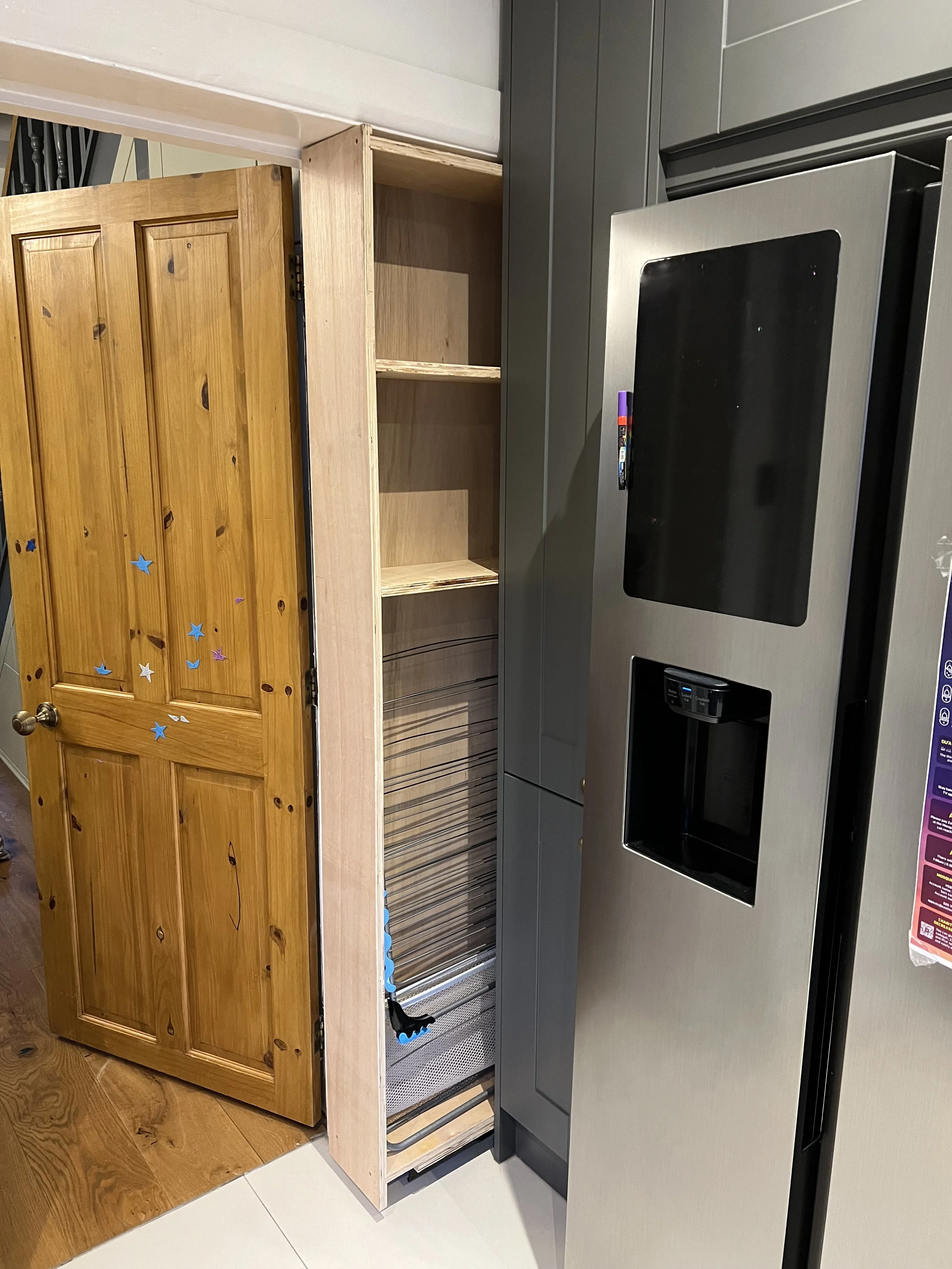 Kitchen Cabinet. Large gap left in the kitchen so we built a pull out cabinet to make use of all of the space.