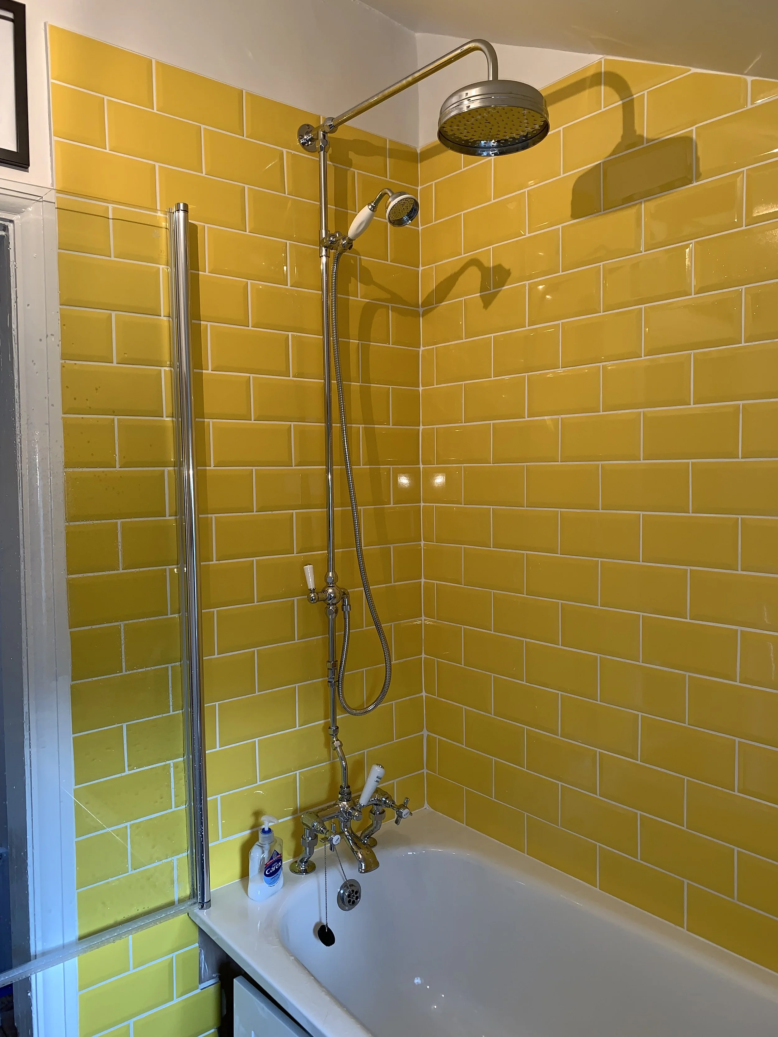 Bathroom Refurbishment Uxbridge. Rip out, relocate the toilet and sink. Light plumbing. Tiling. Shower installation.