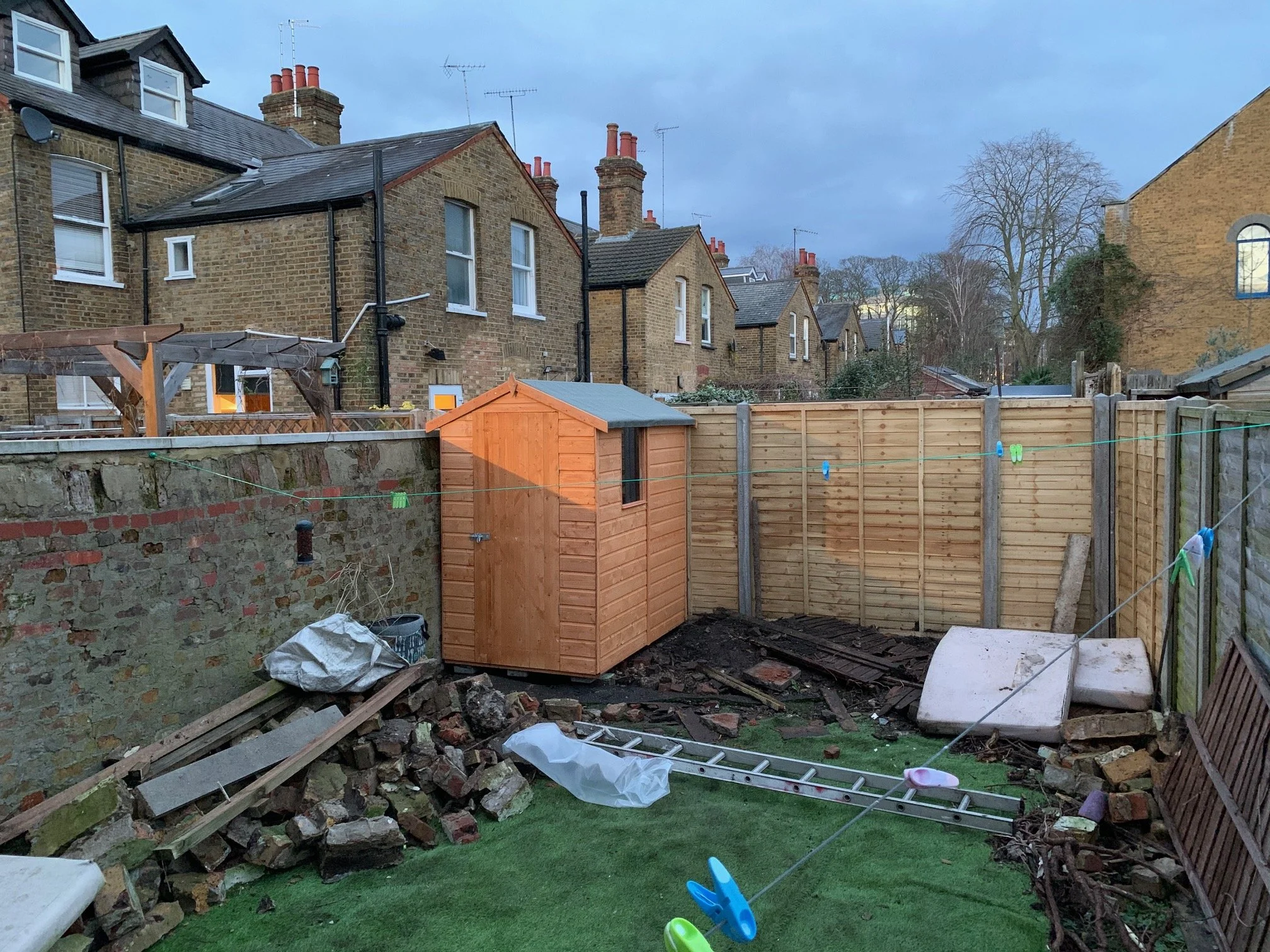 Overgrown garden. Shed building
