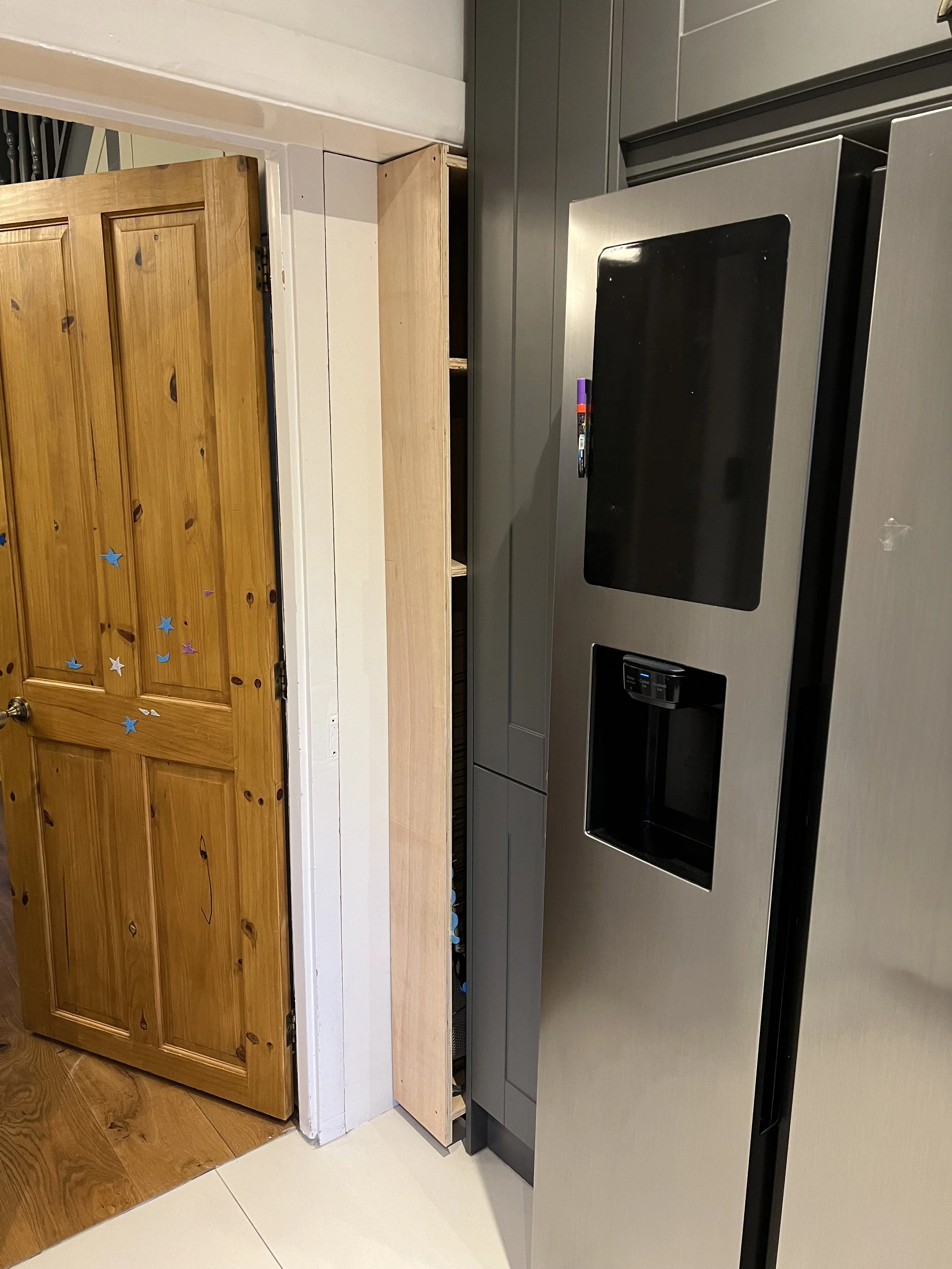 Kitchen Cabinet. Large gap left in the kitchen so we built a pull out cabinet to make use of all of the space.