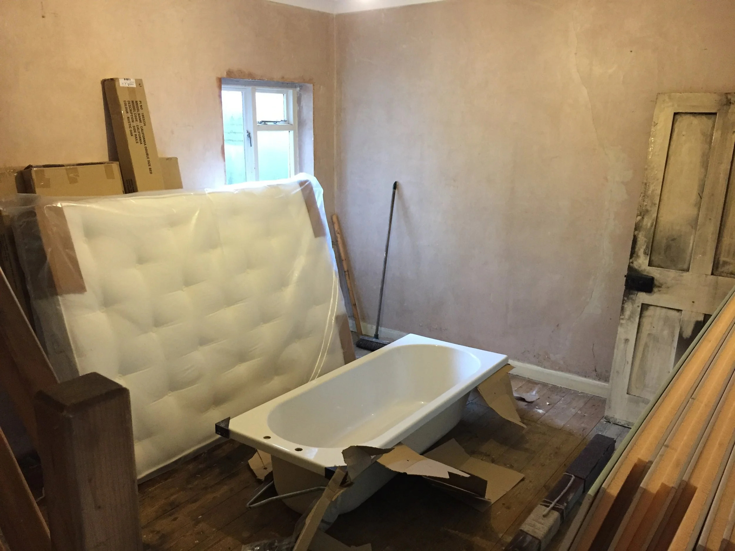 Living room redesign Uxbridge. A couple of walls were removed, leaving a large open plan room. The floors were all sanded and varnished initially. Interior design scheme was agreed and we went on to paint all the walls and cieling. Install coving and