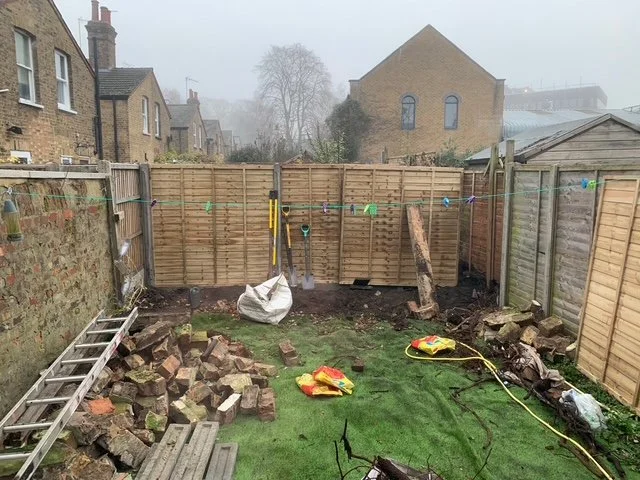 Overgrown garden. Clearout. Fence installation.