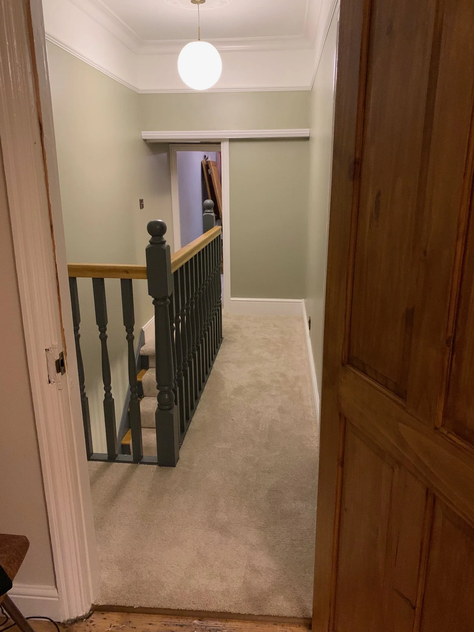 Landing Refurbishment. Painting, coving, skirting boards, sanding and painting the stairs. Ceiling rose. New doors sanded and varnished.