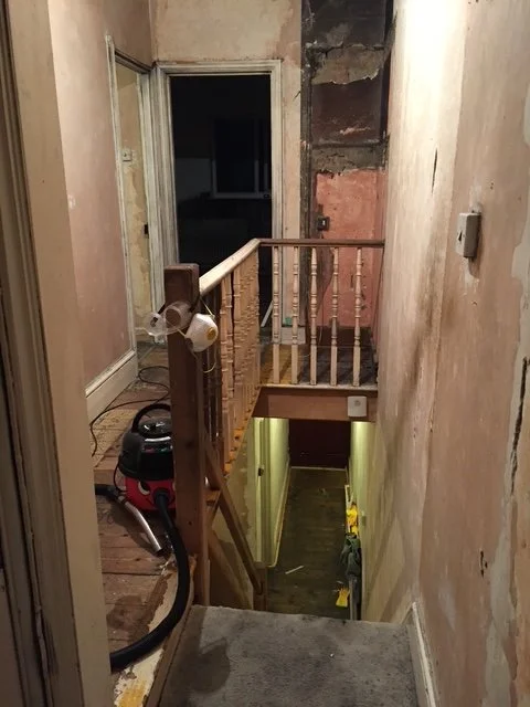 Landing Refurbishment. Painting, coving, skirting boards, sanding and painting the stairs. Ceiling rose.