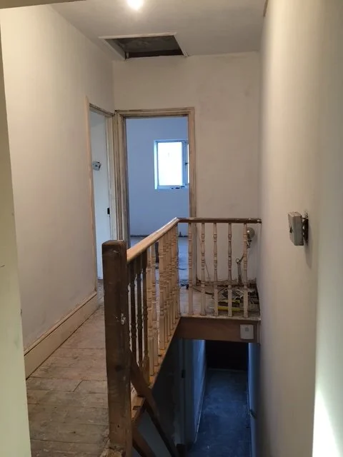 Landing Refurbishment. Painting, coving, skirting boards, sanding and painting the stairs. Ceiling rose. New doors sanded and varnished.