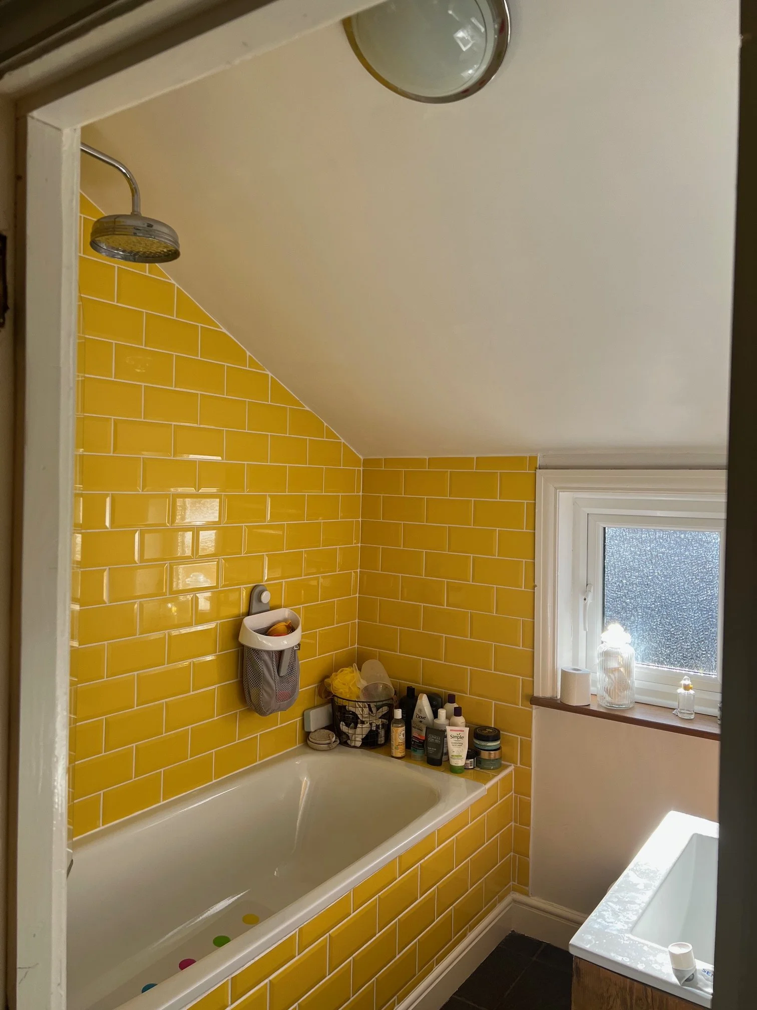 Bathroom Refurbishment Uxbridge. Rip out, relocate the toilet and sink. Light plumbing. Tiling. 