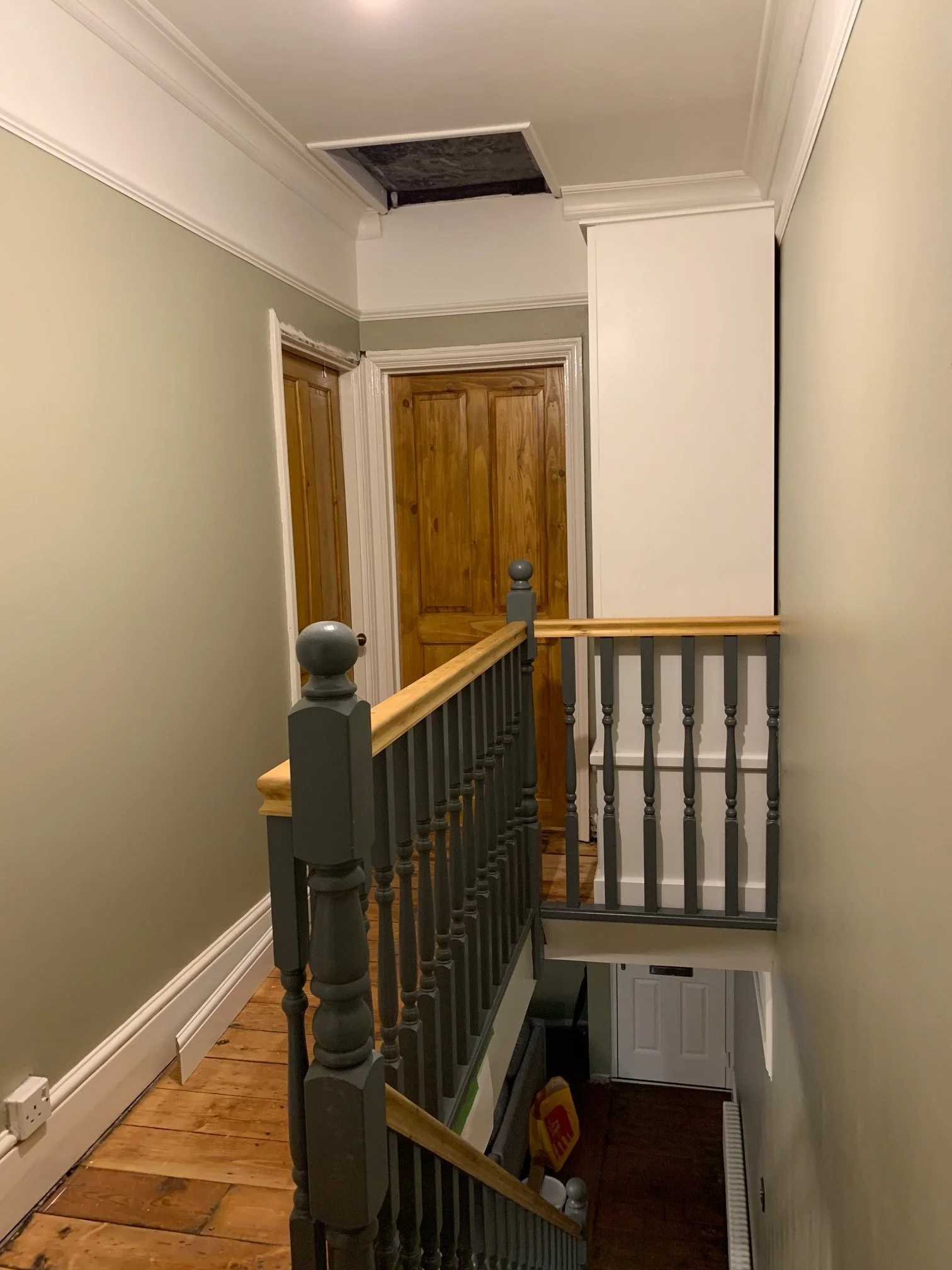 Landing Refurbishment. Painting, coving, skirting boards, sanding and painting the stairs. Ceiling rose. New doors sanded and varnished.