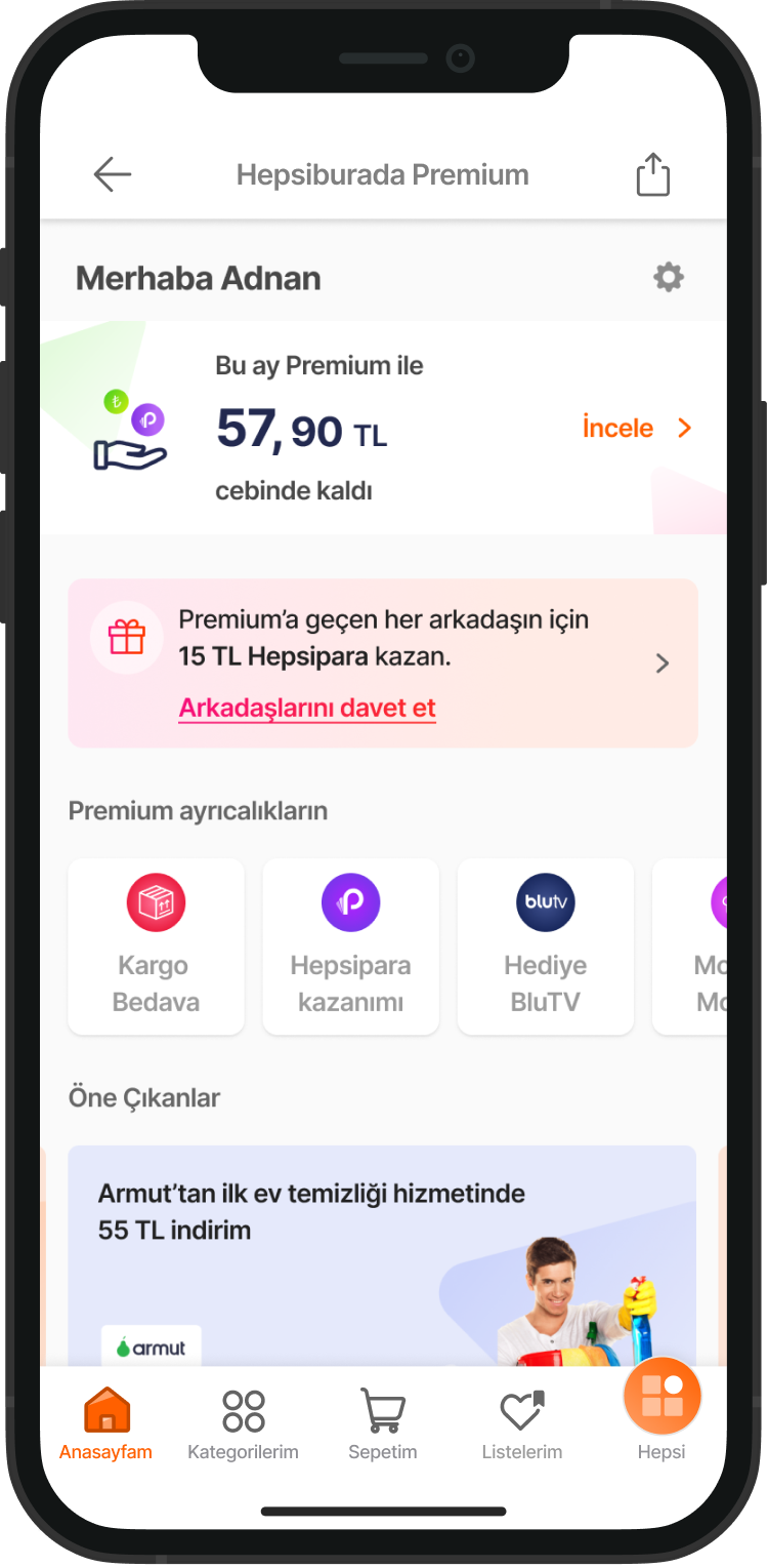 Mobile phone screen displaying a shopping app in Turkish, showing a premium subscription balance of 57.90 TL, with options to purchase and benefits for premium users, including free shipping, earning points, and gift TV.