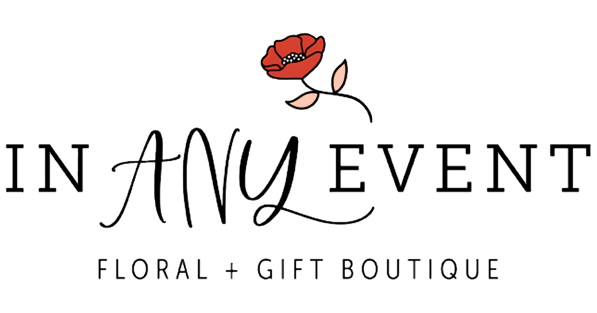 A black silhouette of a woman with long hair, holding a red poppy flower near her face. The image is minimalistic and stylistic.