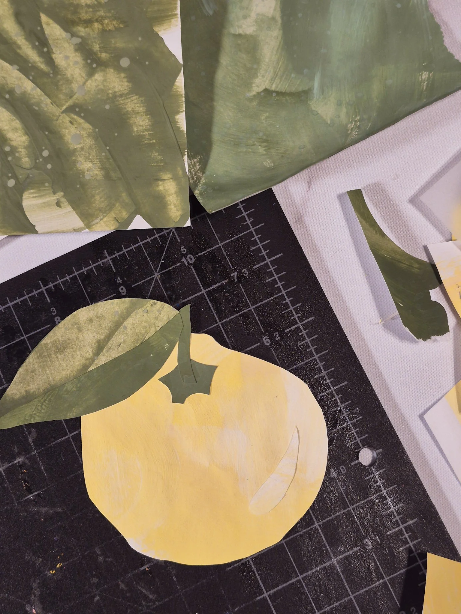 close up image of plump little yuzu paper cut collage