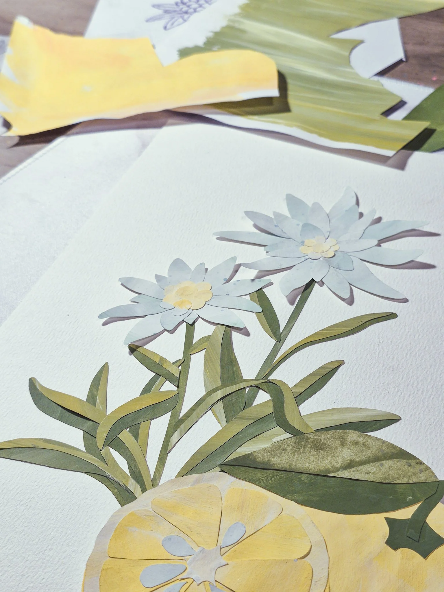 almost completed papercut collage of edelweiss and yuzu