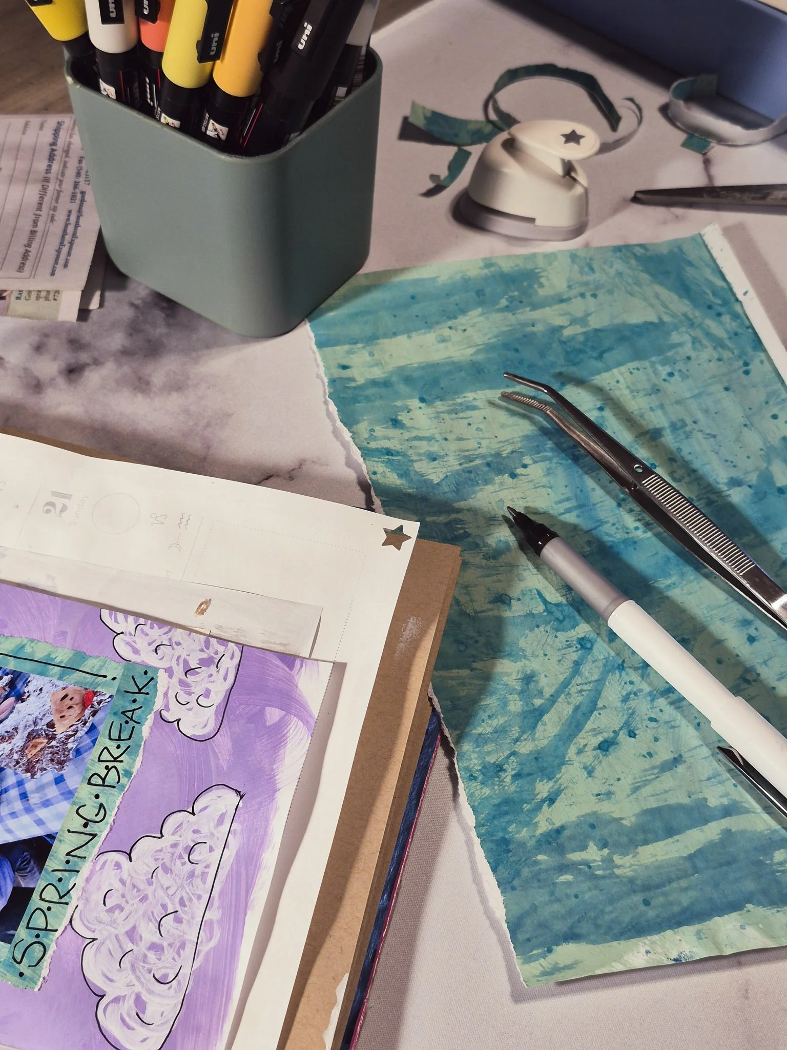 Art journaling and collage process with painted paper and layered textures