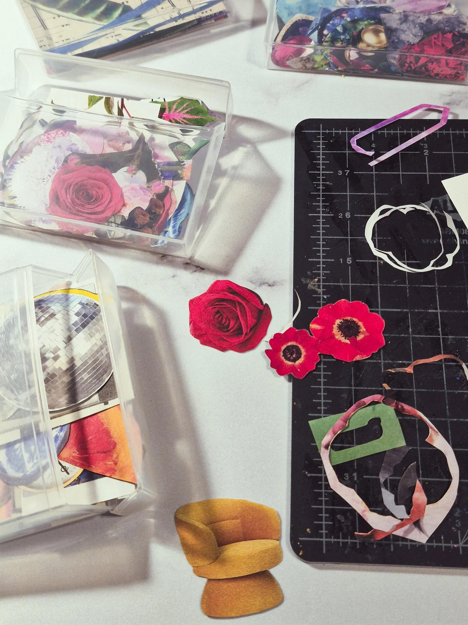 overhead desk shot of analog collage process