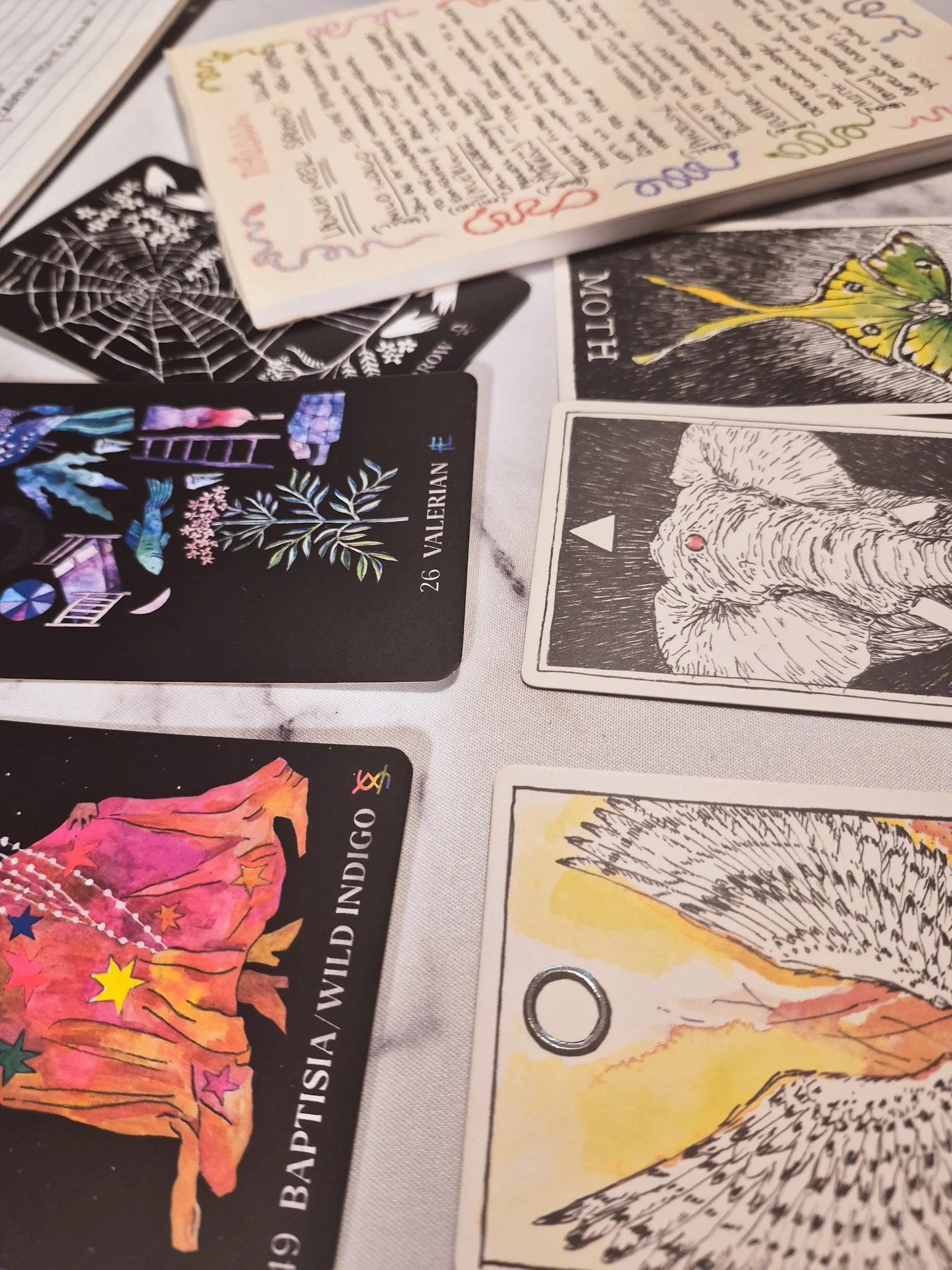 close up overhead shot of oracle card spread