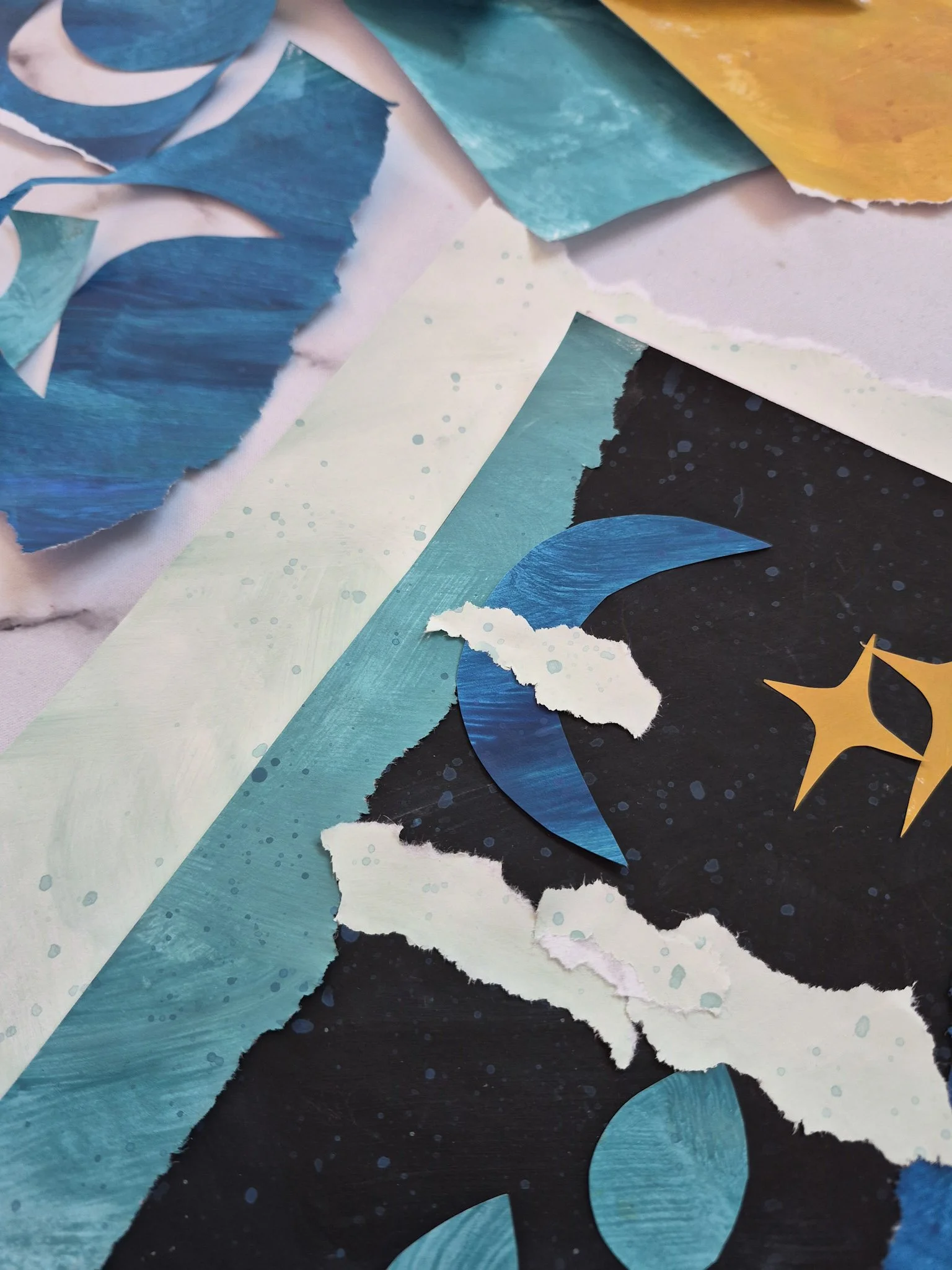 torn painted paper collage moon clouds