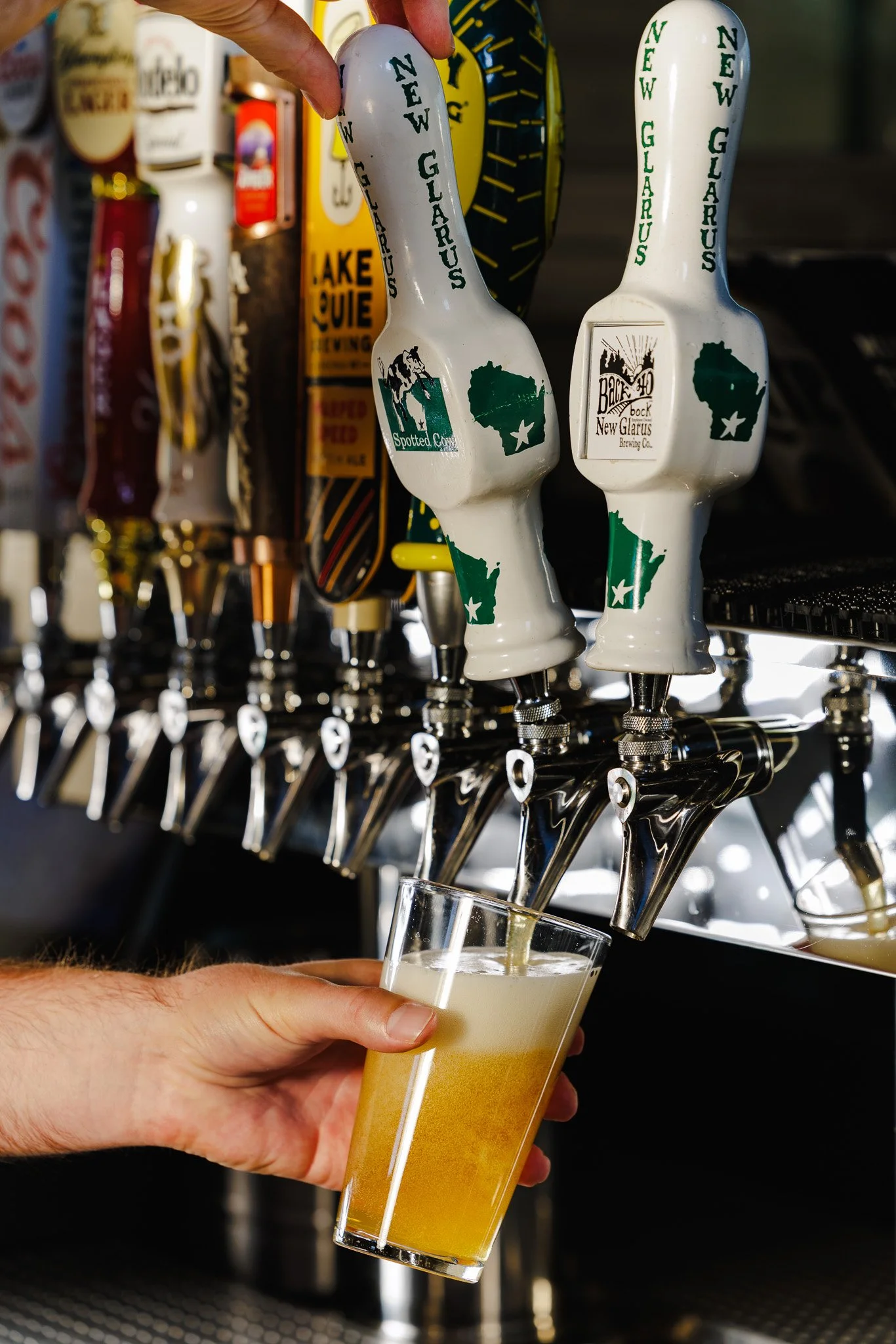 Bartender pouring a beer