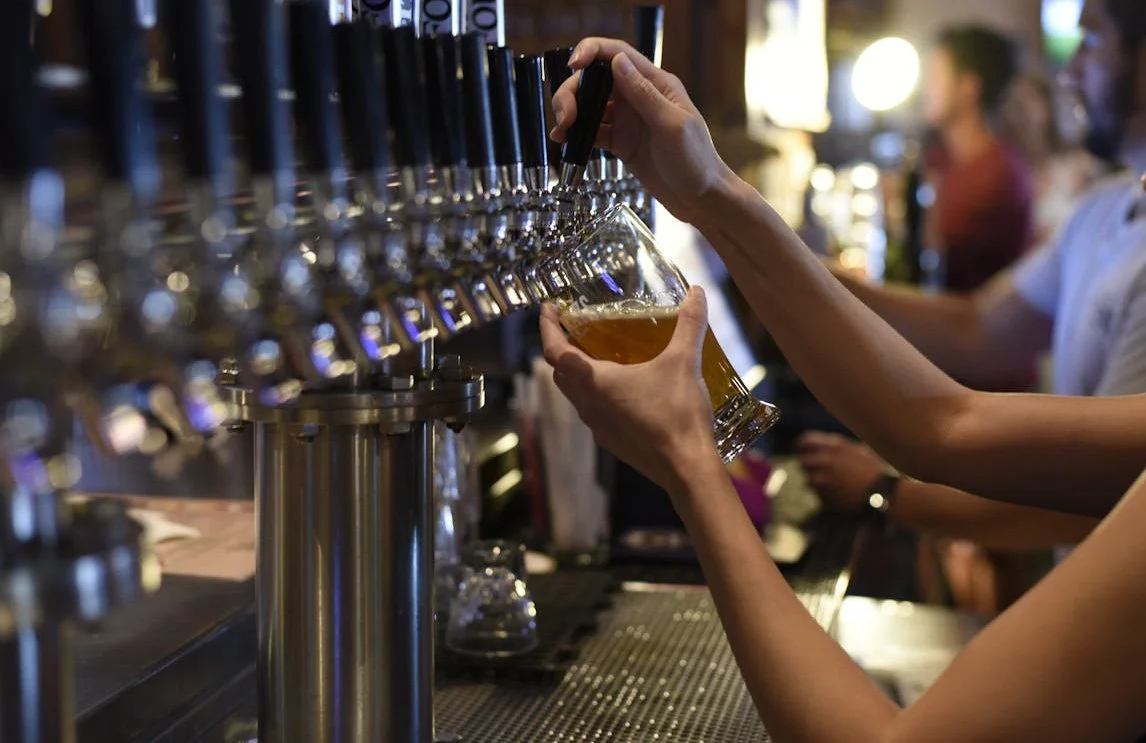 Bartender pouring a beer