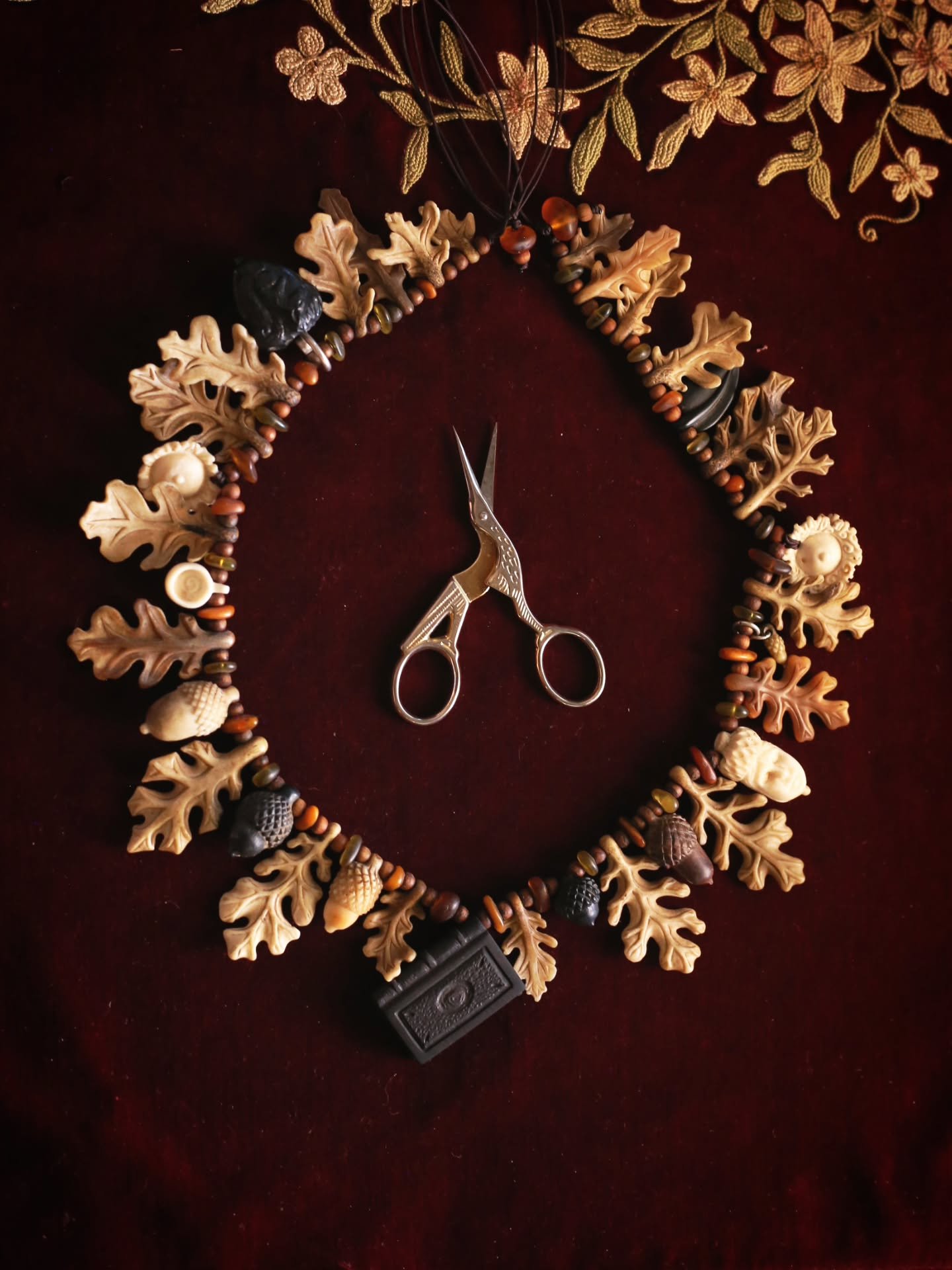 Getting to work on this necklace was a deeply moving experience for me. I will admit, I was crying by the time I finished the restringing process. This necklace could be called a collaboration piece, though some of the artists will never met, and was