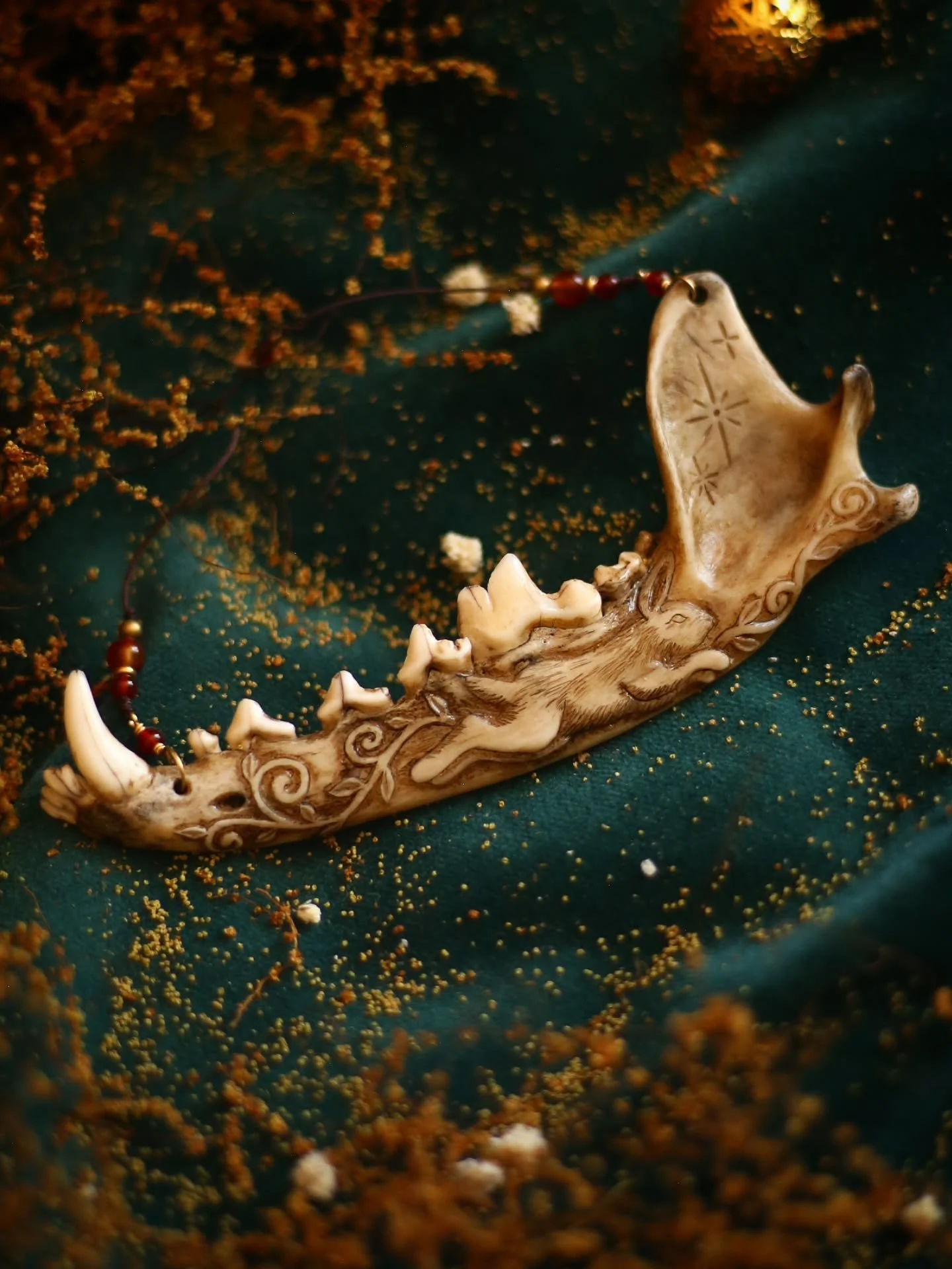 Behold, the rabbit that haunted my dreams for nigh on six months! I had an artistic vision (one of those image stuck in your head kinds) of an ancient manuscript painted hare with filigree vines and stars. Took me months of carving a little, scratchi