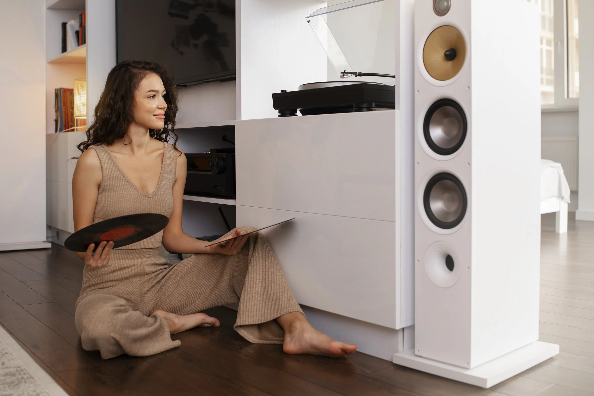 woman-digital-disconnecting-home-by-listening-music-vinyl.jpg