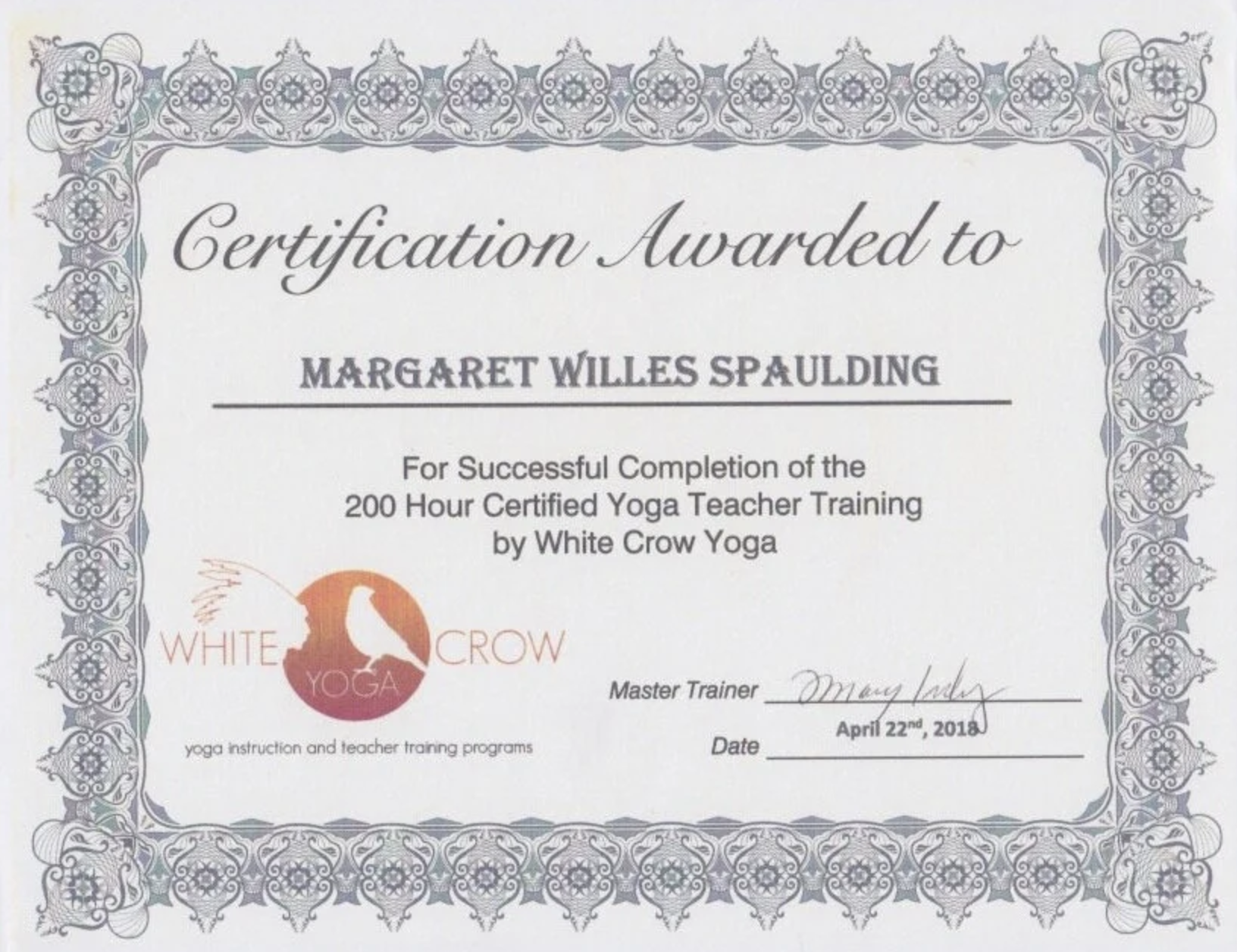 Certificate of completion from White Crow Yoga for completing a 200-hour certified yoga teacher training for Margaret Spaulding, signed by the master trainer, May July, dated April 22nd, 2018.