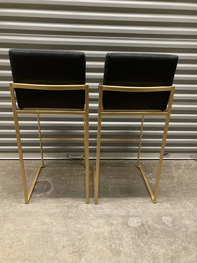 Modern kitchen island with LumiSource Fuji 30 inch black and gold bar stools