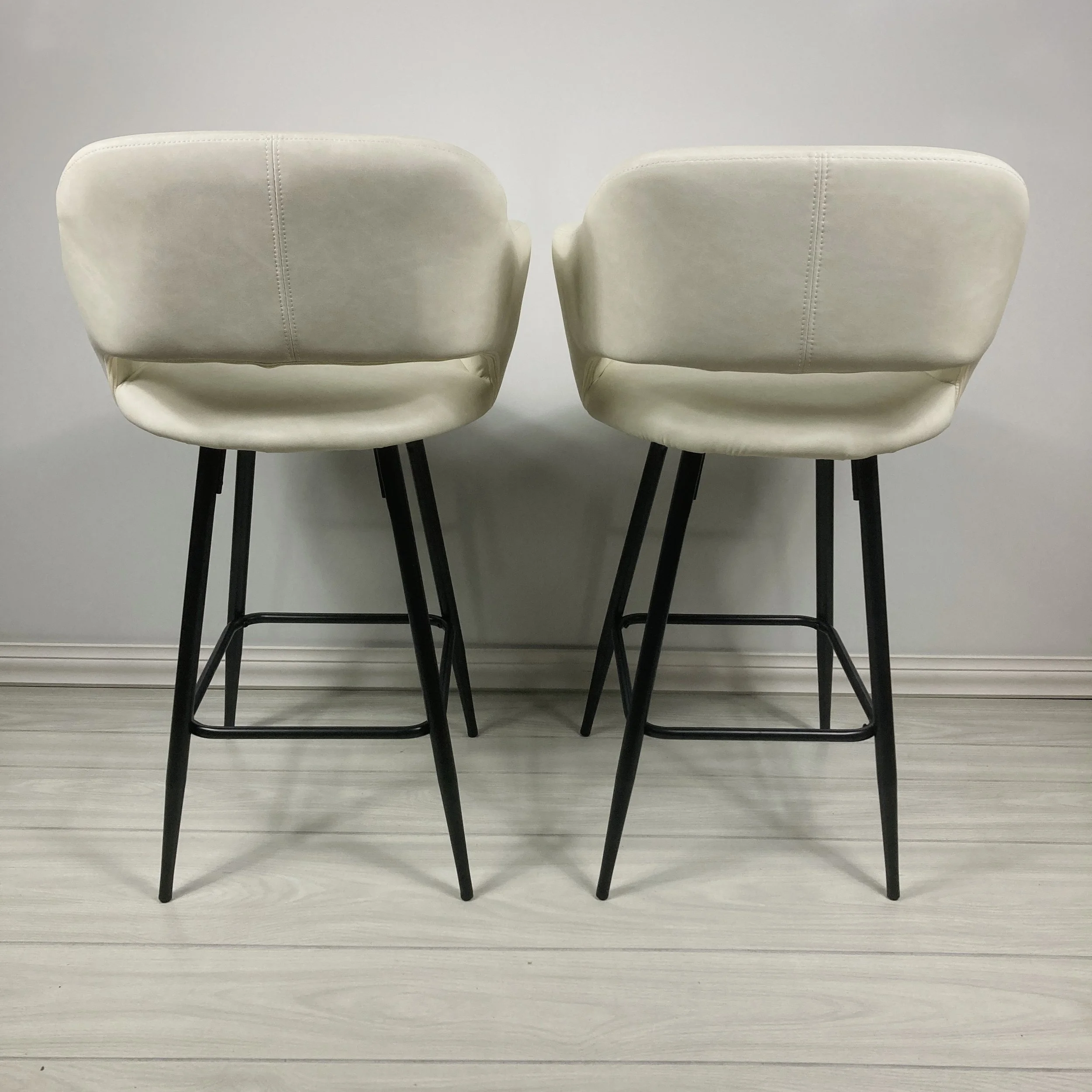 MARGARITE-25-INCH-COUNTER-STOOLS-SET-OF-2-WHITE-FAUX-LEATHER-PU-AND-BLACK-METAL-BASE-BACK-VIEW.JPG