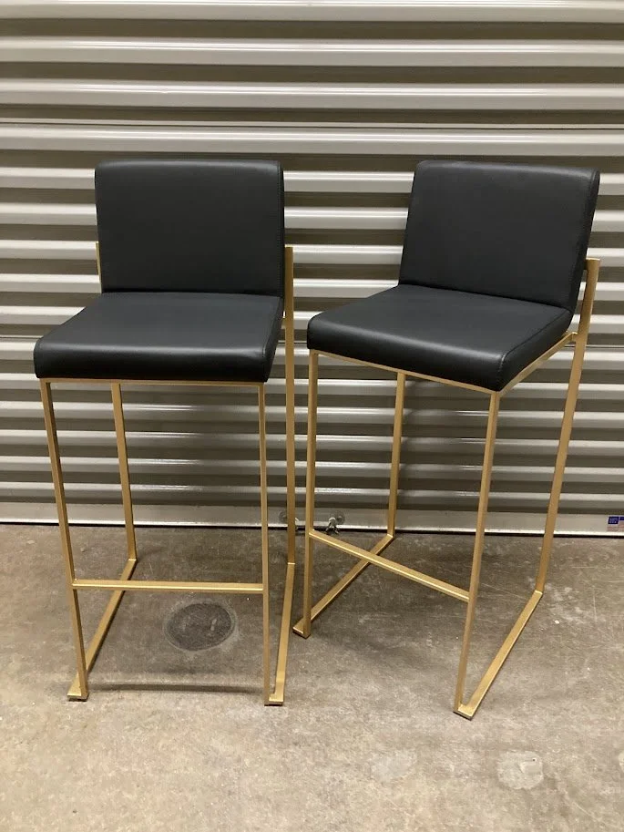 Front view of LumiSource Fuji 30 inch black and gold bar stools for kitchen island
