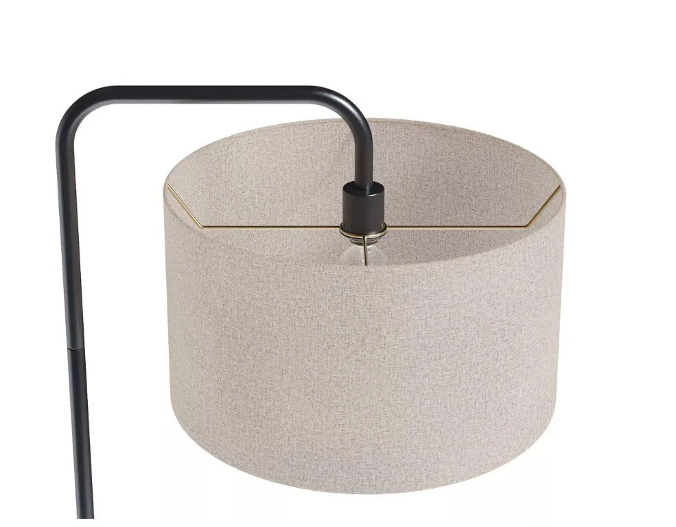 Close up of beige linen shade on LumiSource Puck floor lamp