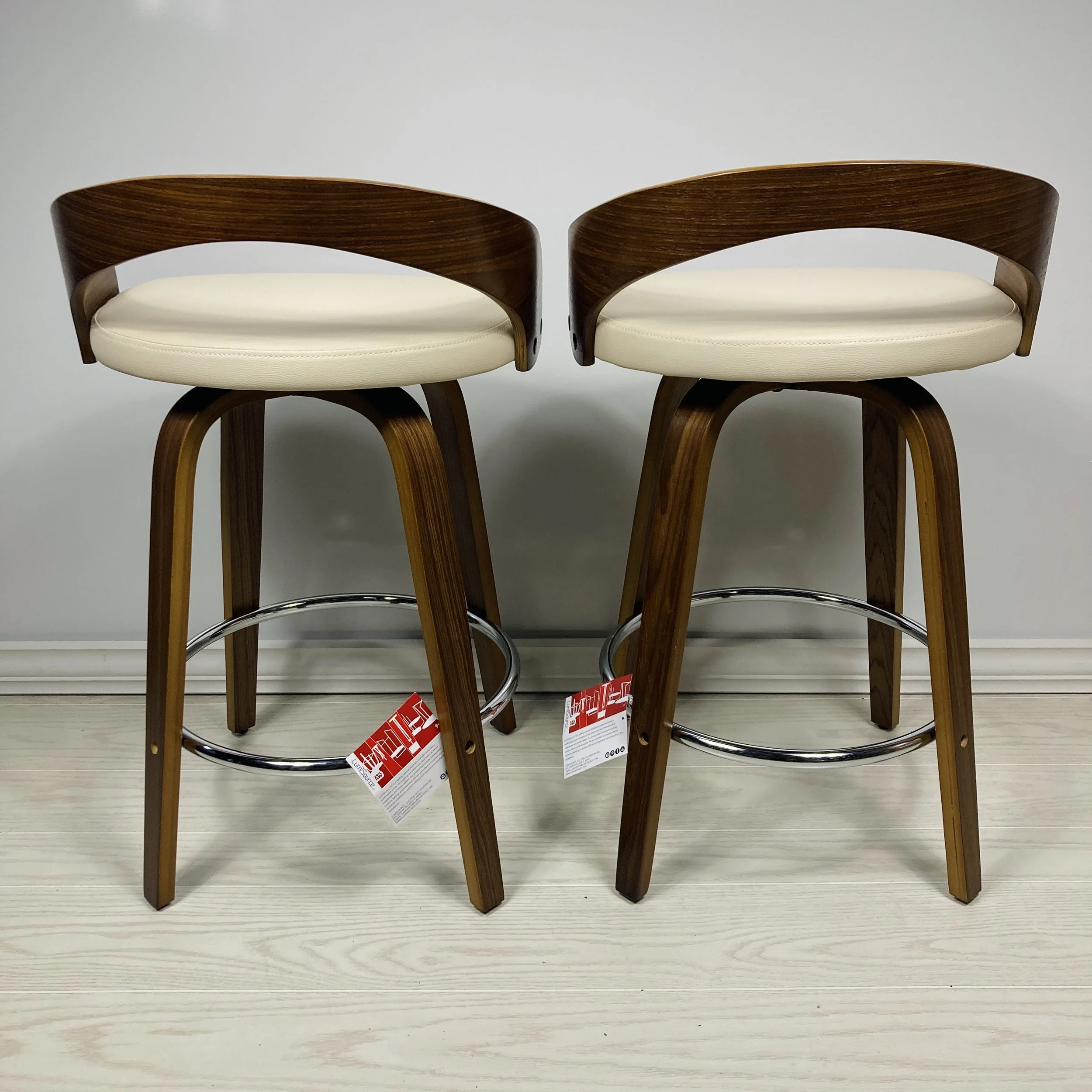 grotto-counter-stools-24-25-26-inch-walnut-wood-cream-faux-leather-chrome-footrest-back-view.JPG