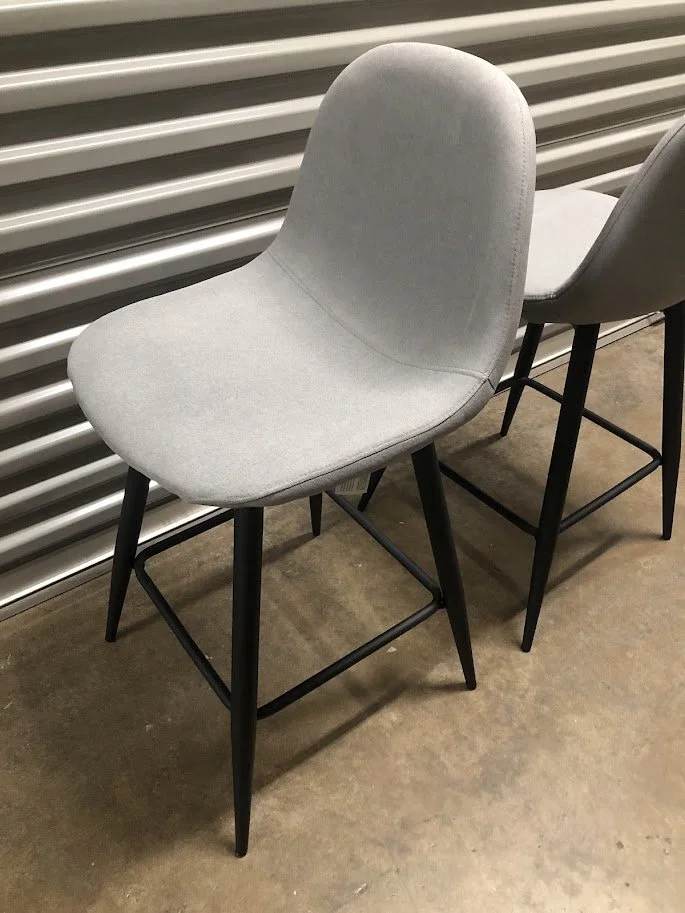 Curved backrest detail on LumiSource Pebble grey counter stool