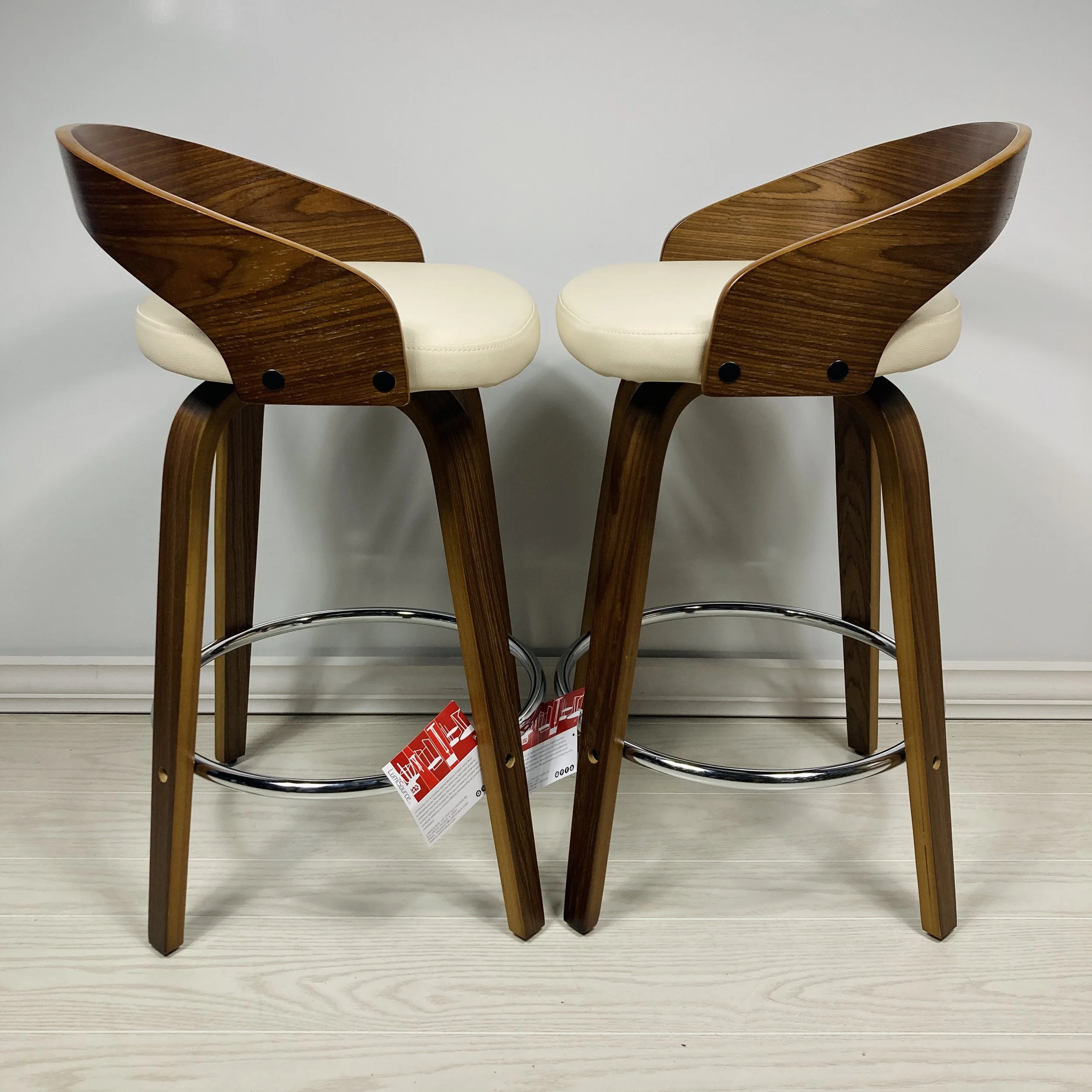 grotto-counter-stools-24-25-26-inch-walnut-wood-cream-faux-leather-chrome-footrest-side-view.JPG