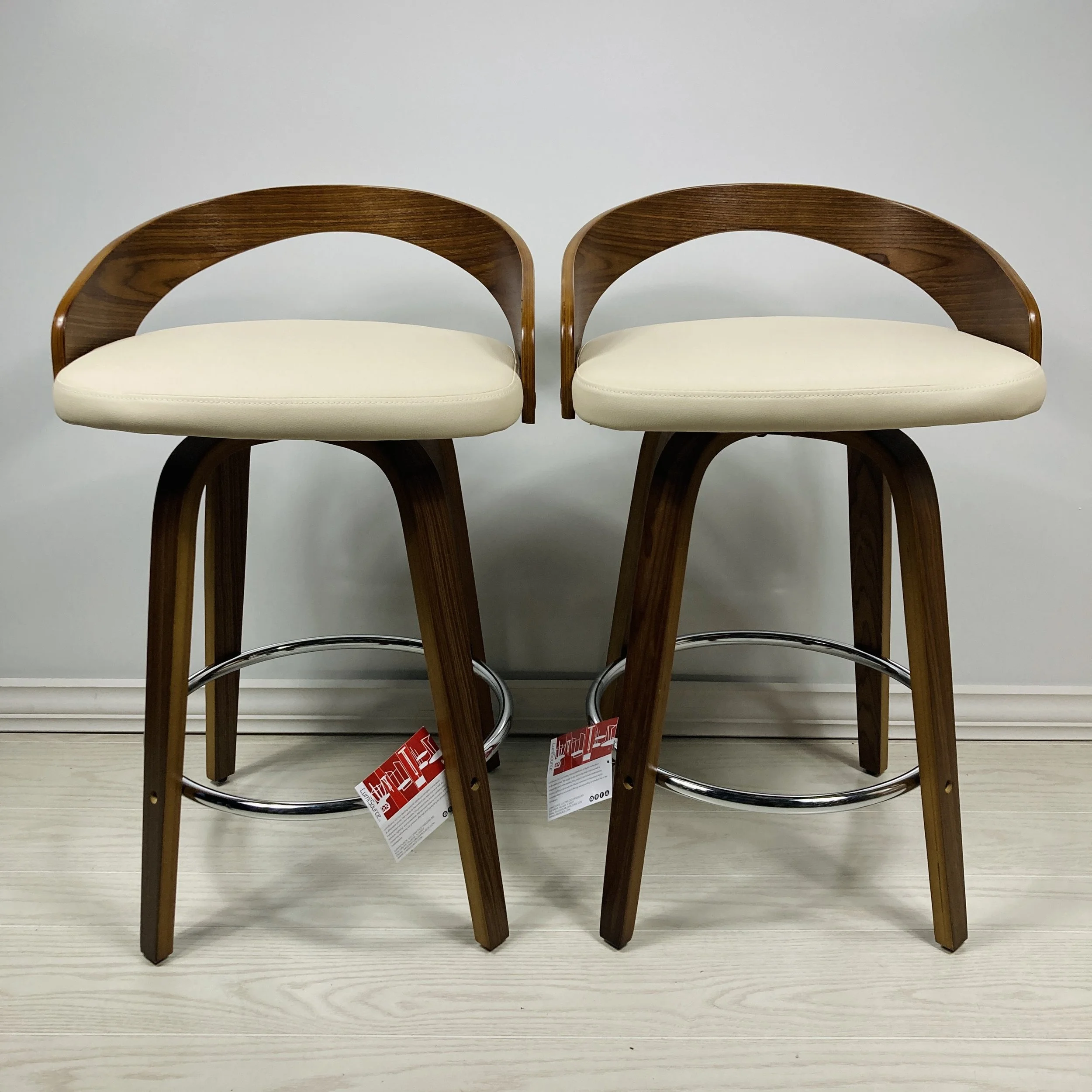 grotto-counter-stools-24-25-26-inch-walnut-wood-cream-faux-leather-chrome-footrest-set-of-2.JPG