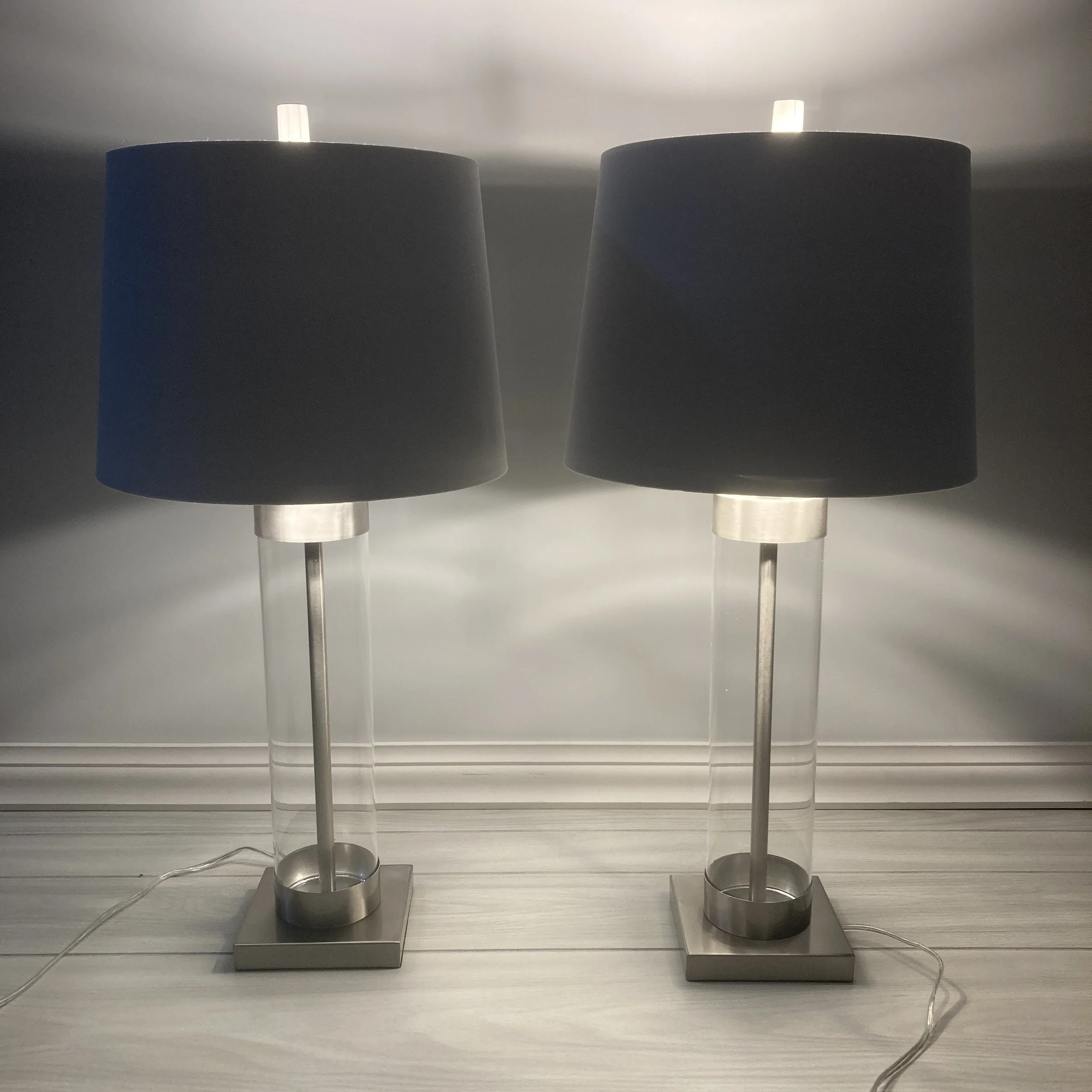 GLACIER-TABLE-LAMPS-SET-OF-2-CLEAR-GLASS-AND-WHITE-SHADES-ON.JPG
