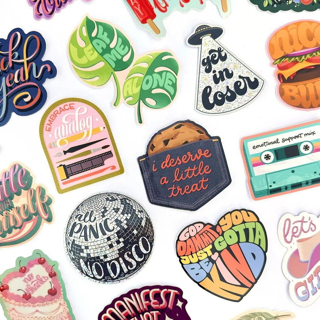 sticker flat lay 2025 web square 1080.jpg