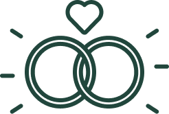 Drawing of an outline ring with a heart shape above and lines.
