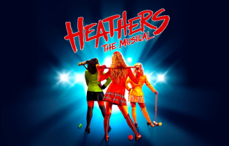 Poster for 'Heathers The Musical' featuring three women with their backs turned, holding hands, with a dark background and bright blue light behind them.
