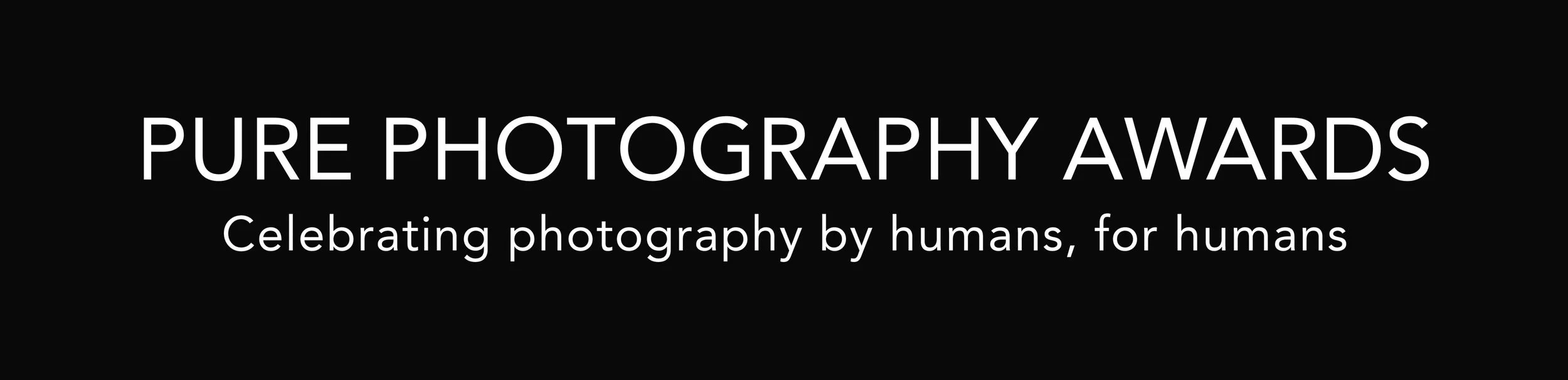 Pure Photography Awards logo with the tagline “Celebrating photography by humans, for humans.”