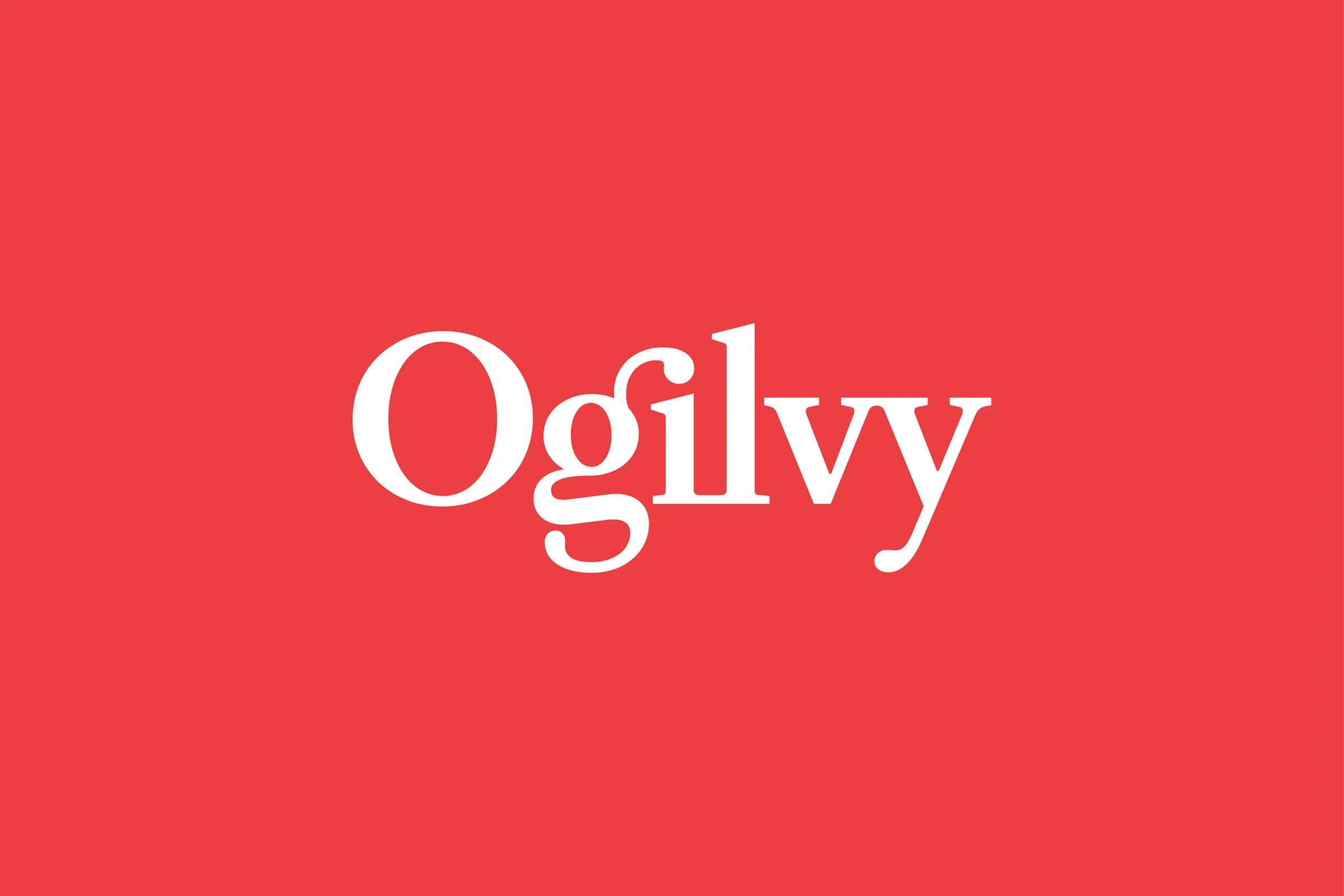 Red background with the word 'Ogilvy' written in white, rotated upside down.