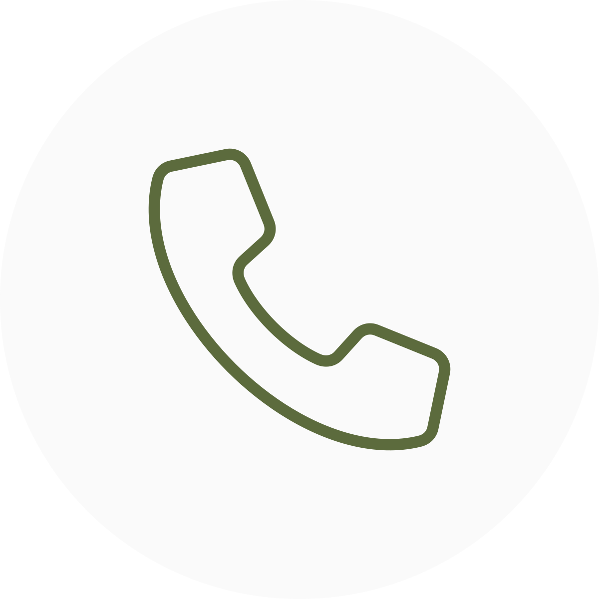 Icon of a green telephone handset on a white circular background.