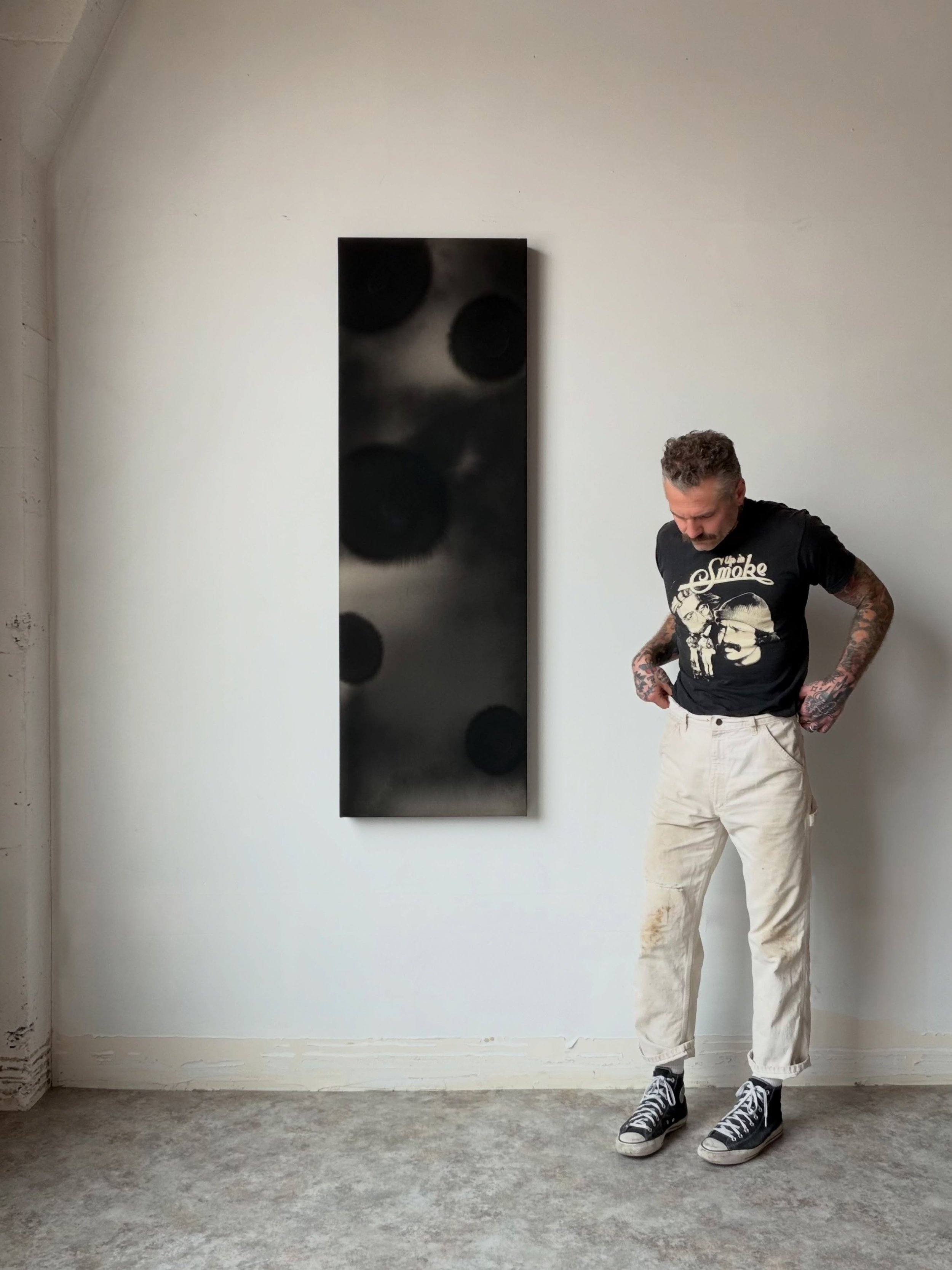 AVAILABLE. &ldquo;STATIC PULSE&rdquo; 2026, 61&rdquo;x20&rdquo;

India ink and distilled water on raw canvas.

&ldquo;Static Pulse&rdquo; captures the haunting, shadowed energy of a recurring eclipse. Soft, dark spheres hang in a hazy visual frequenc