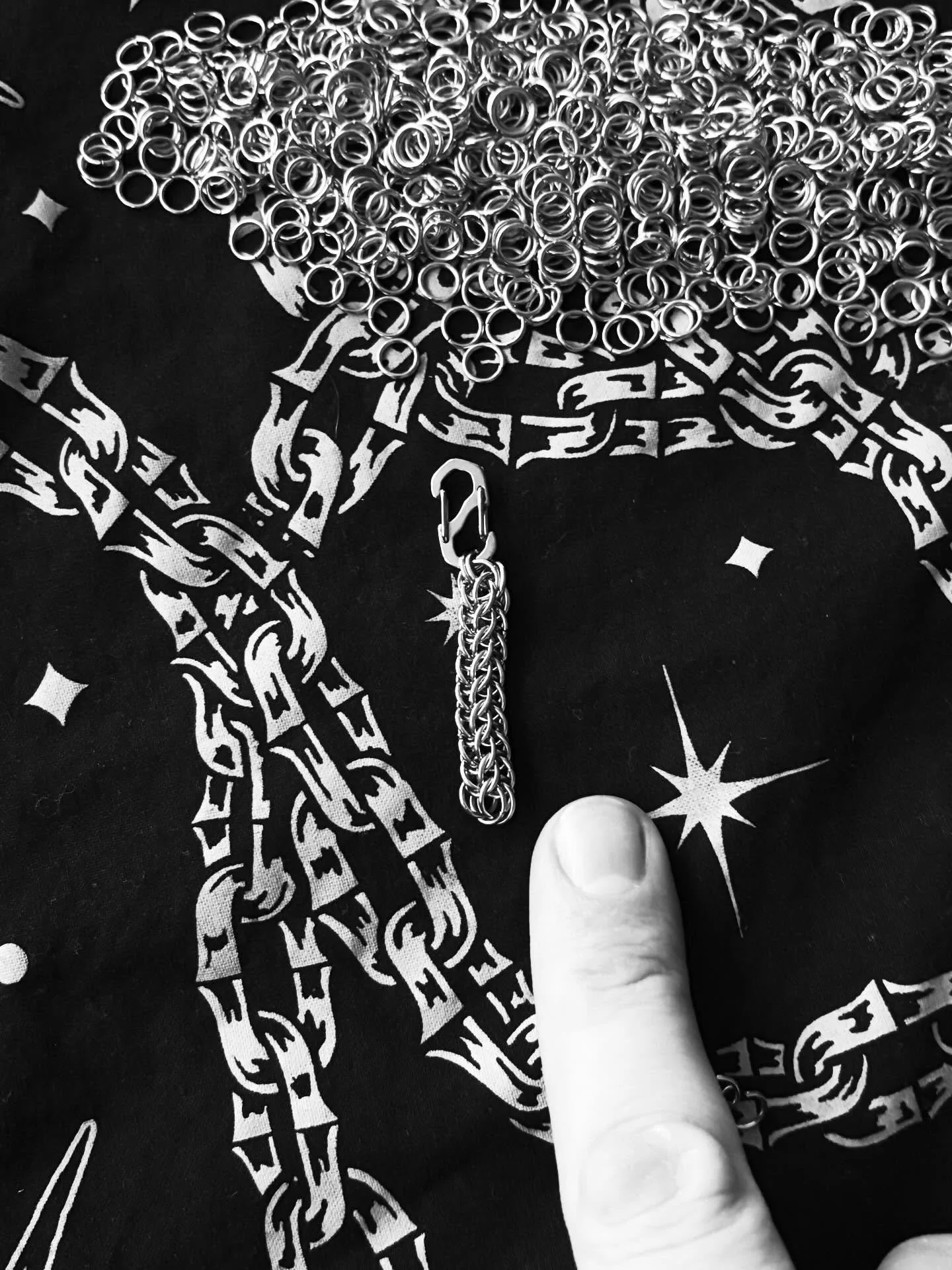 Complexity in scale, where repetition becomes architecture. It&rsquo;s a slow process forging these tight weaves, but what a statement it makes!
.
.
#chainmaille #slowmade #industrialromantic #darkminimalism #handlinked