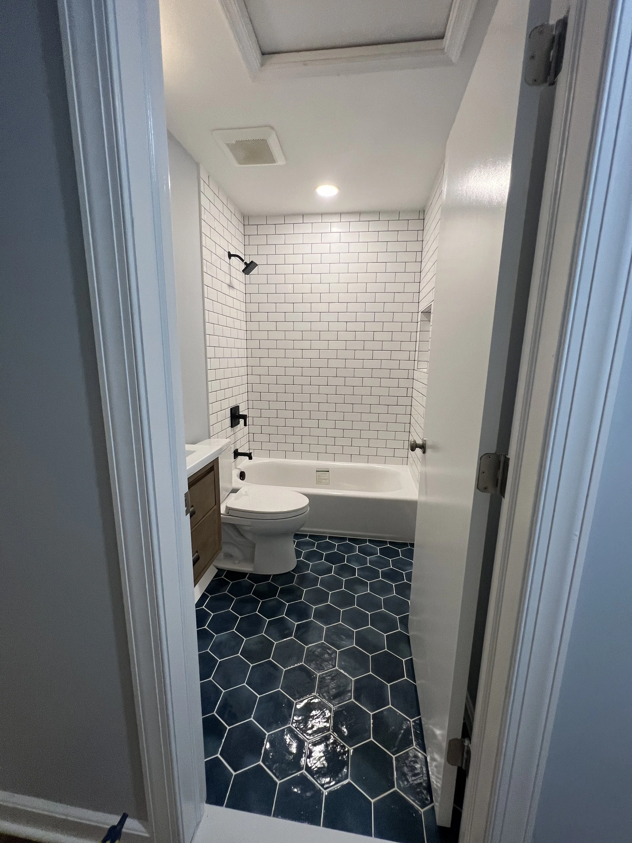 Bathroom Remodel_Falls Church_Blue Hexagon tile.jpeg