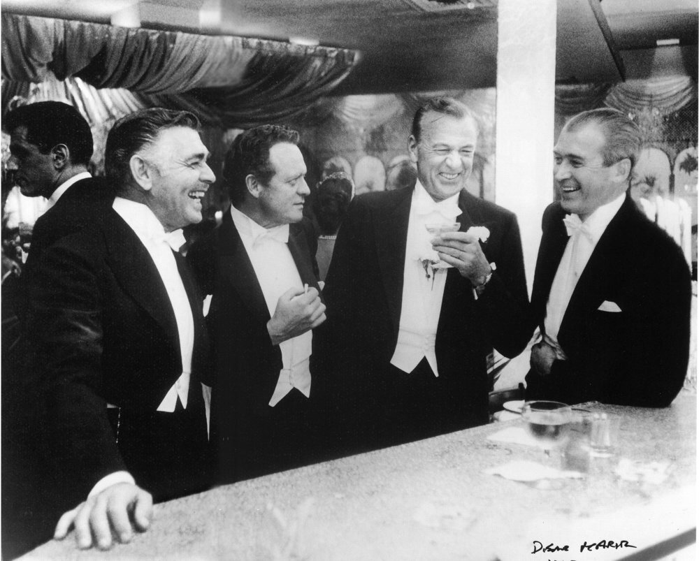 The famous Slim Aarons photo, "The Kings of Hollywood." Taken at New Years Eve celebration at Romanoff's restaurant.
