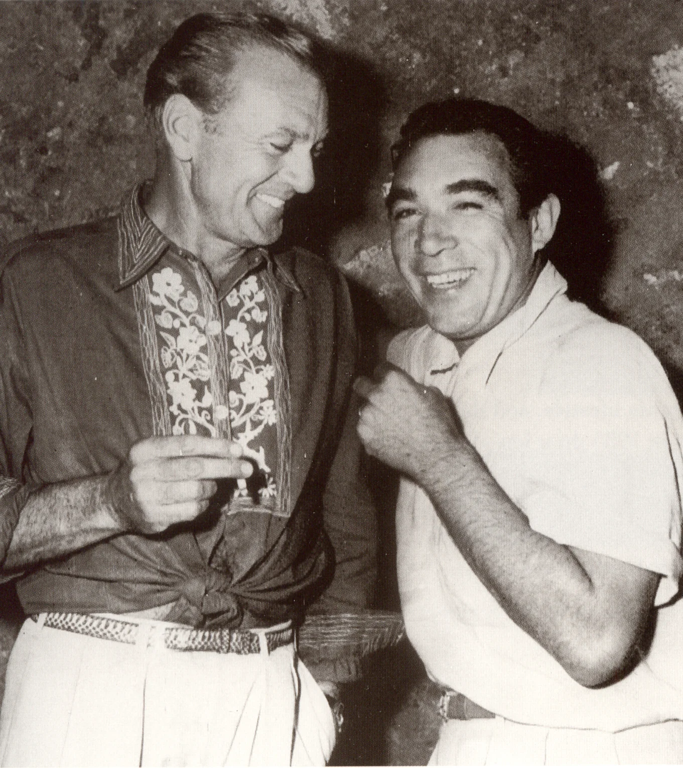 Tony Quinn and my father having a ball on location. 