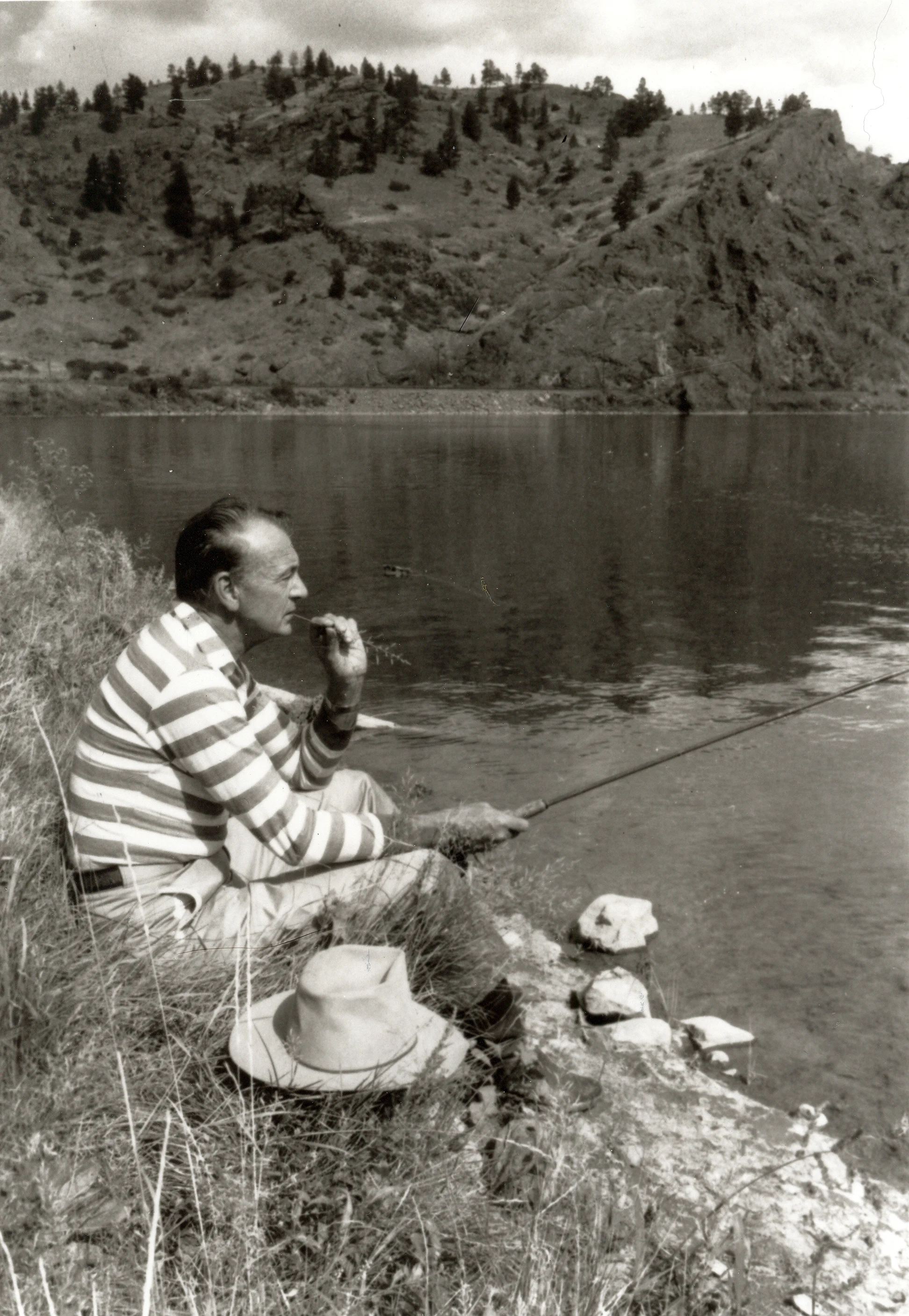 My father sitting by the river that ran through the bottom of his family’s ranch. I wonder what his memories were bringing into focus.
