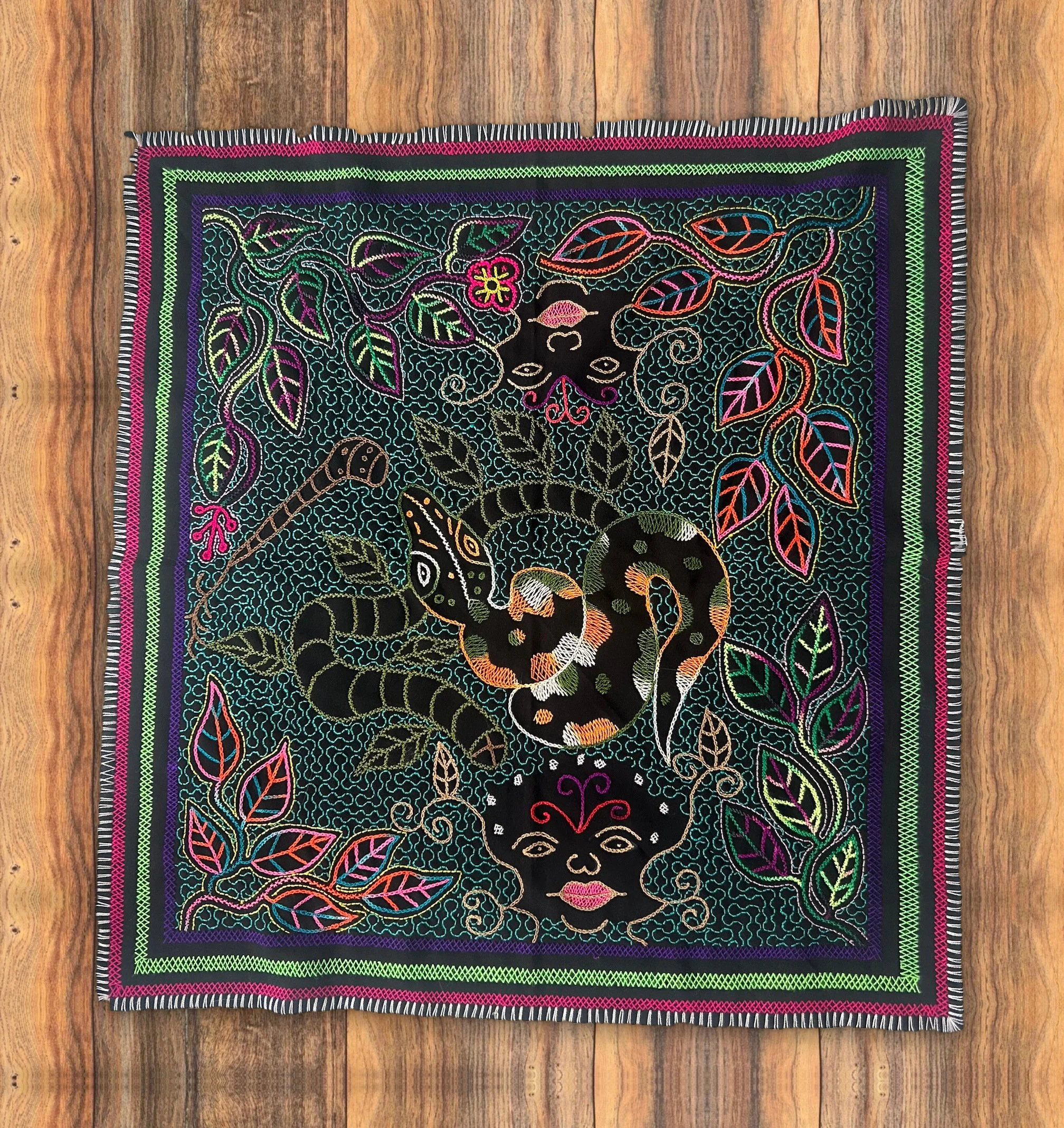 Serpent Twin Faces