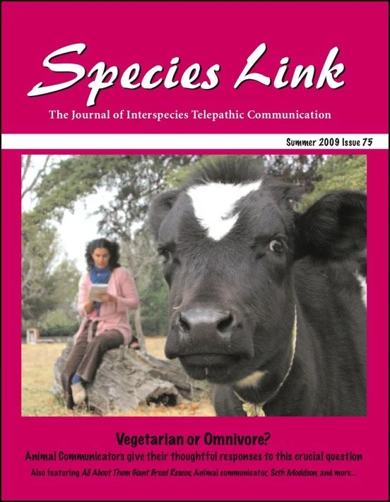 Magazine cover titled "Species Link" with a photo of a woman sitting on a log reading a book and a black and white cow in the foreground. The magazine is from Summer 2009, Issue 75, and focuses on animal communication.